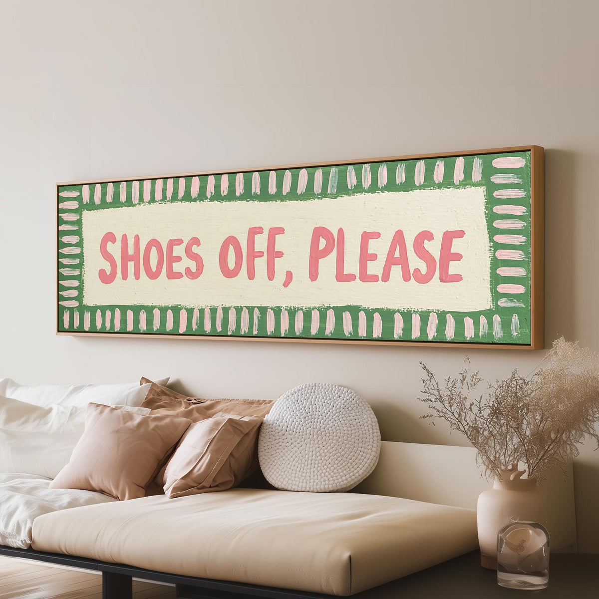 Shoes off, please sign panoramic canvas print above a sofa in a living room