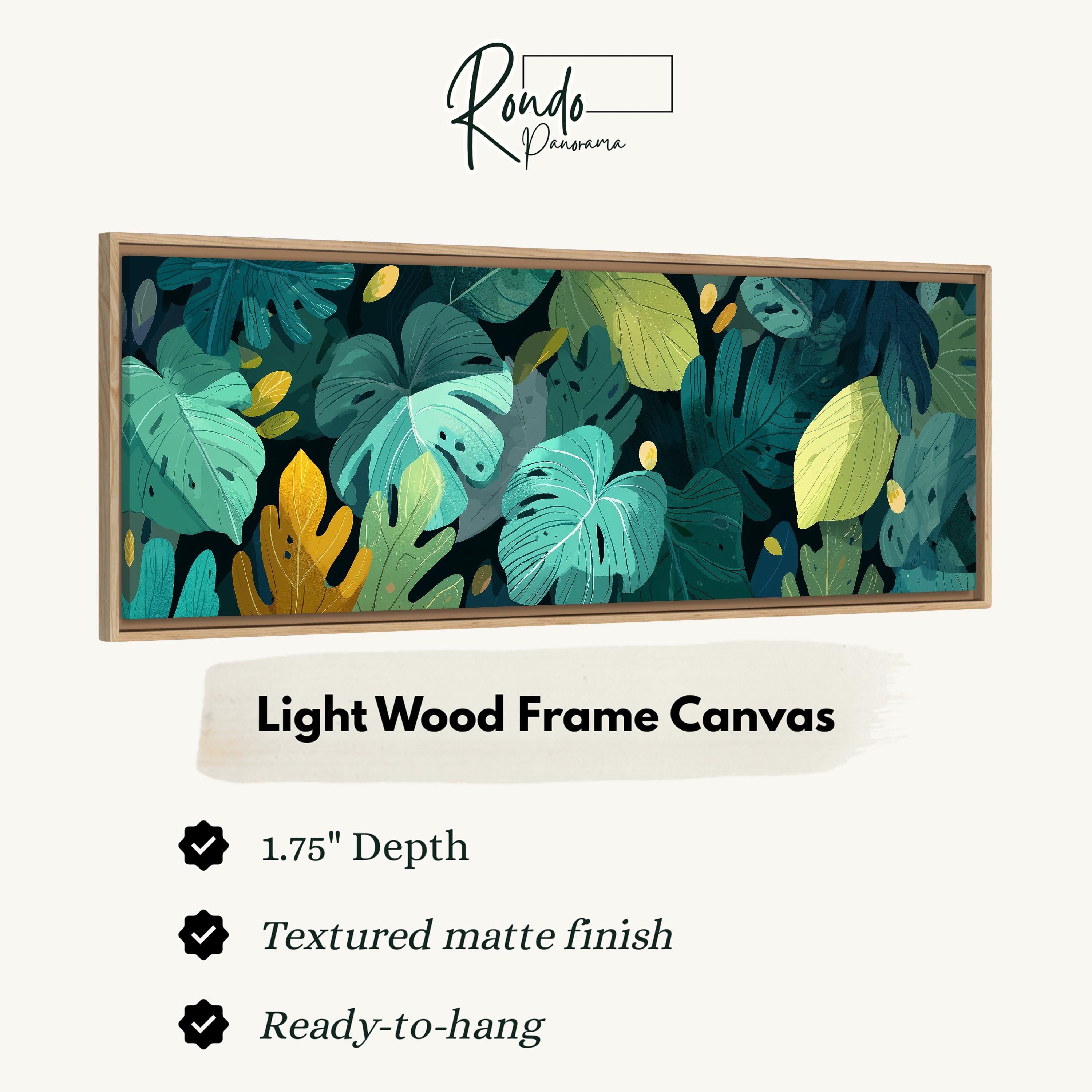a light wood frame canvas with a vibrant, tropical leaf pattern.