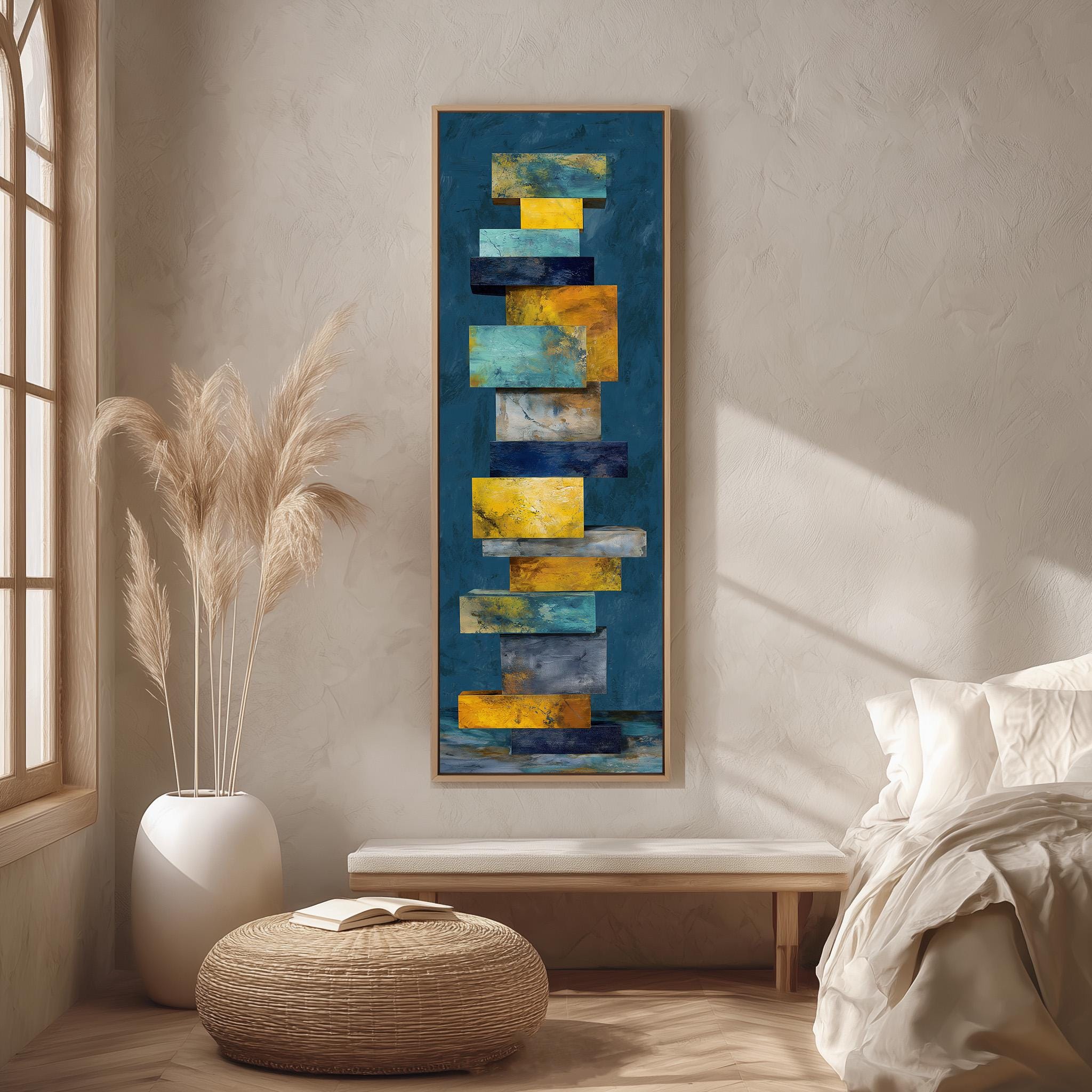 a modern art piece with a blue and yellow color scheme, hanging on a wall in a minimalist bedroom setting.