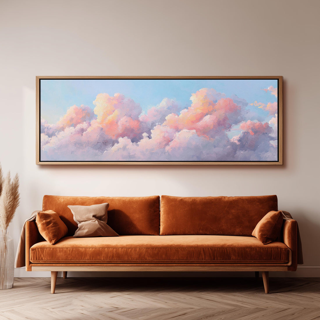 a large bed with a white comforter and pillows, and a large canvas print of a cloud-filled sky above it.