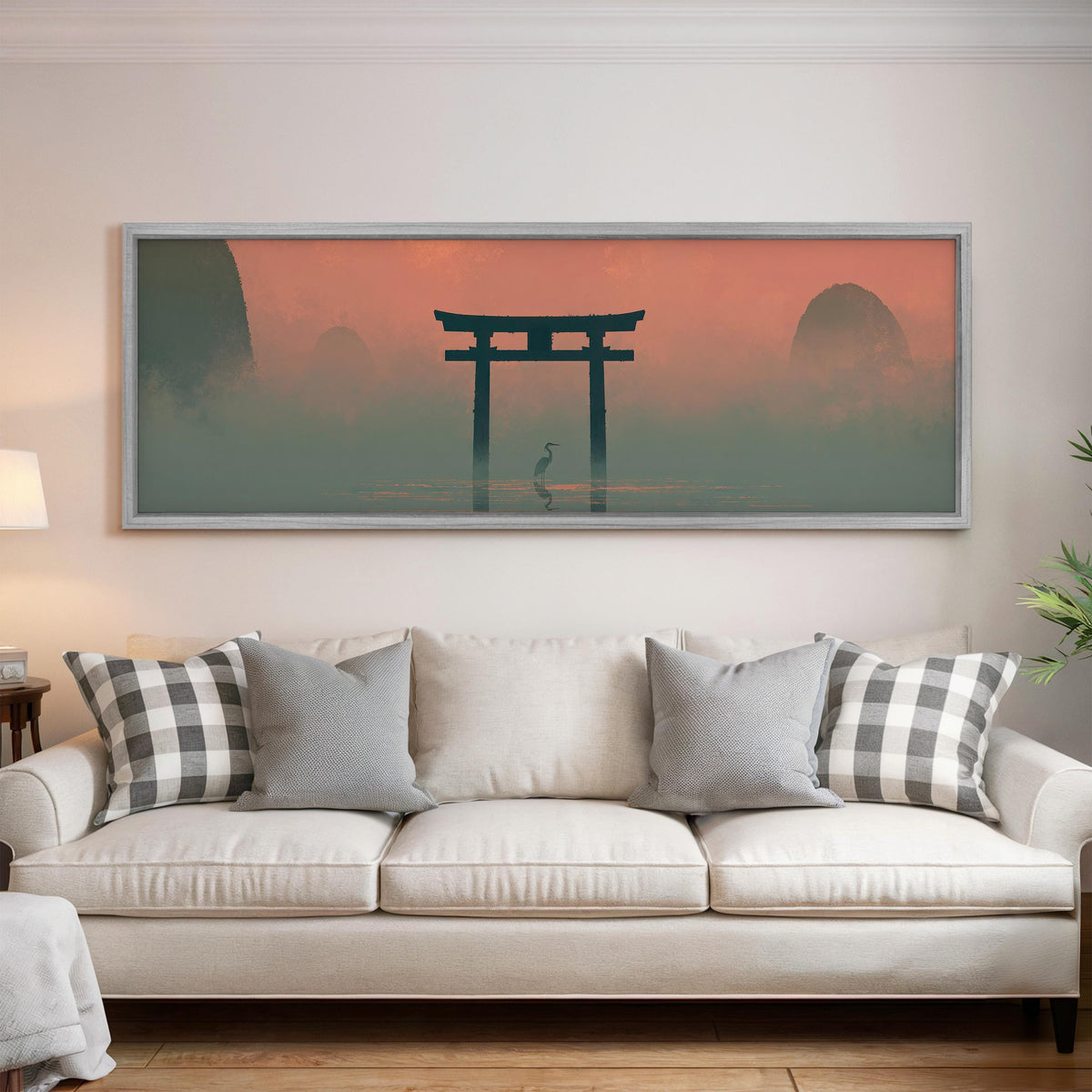 Torii gate and heron in pink mist panoramic canvas print above a white sofa in a bright living room