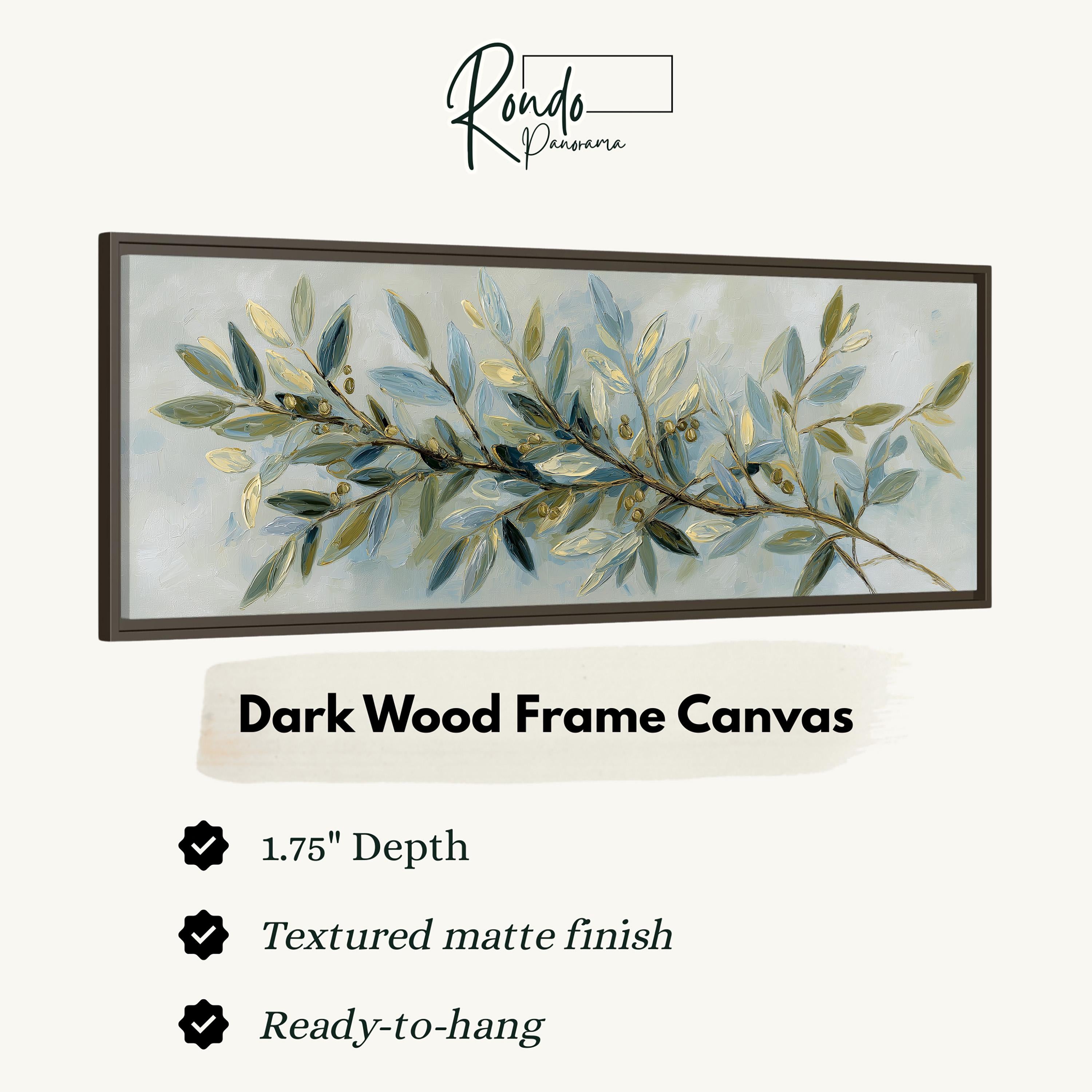 The image is a framed artwork depicting a branch of green leaves with gold accents. The frame is described as a dark wood frame canvas, with a 1.75" depth and a textured matte finish. It is ready to hang.
