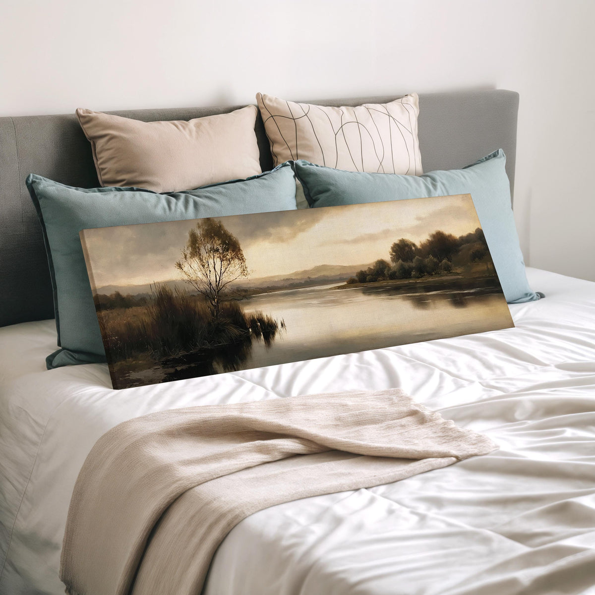 Misty river reflection at dusk wide panoramic canvas print laid on a bed to show its size