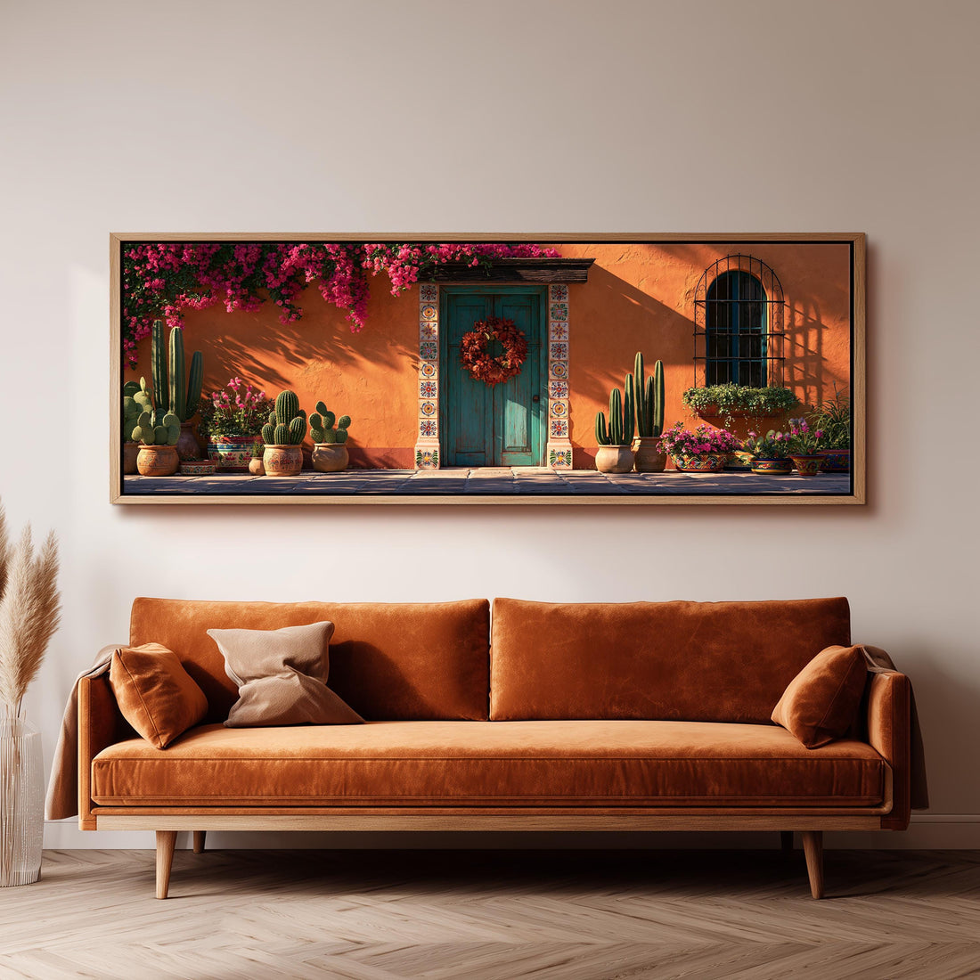 Mexican courtyard doorway with bougainvillea long horizontal canvas print above a sofa in a living room