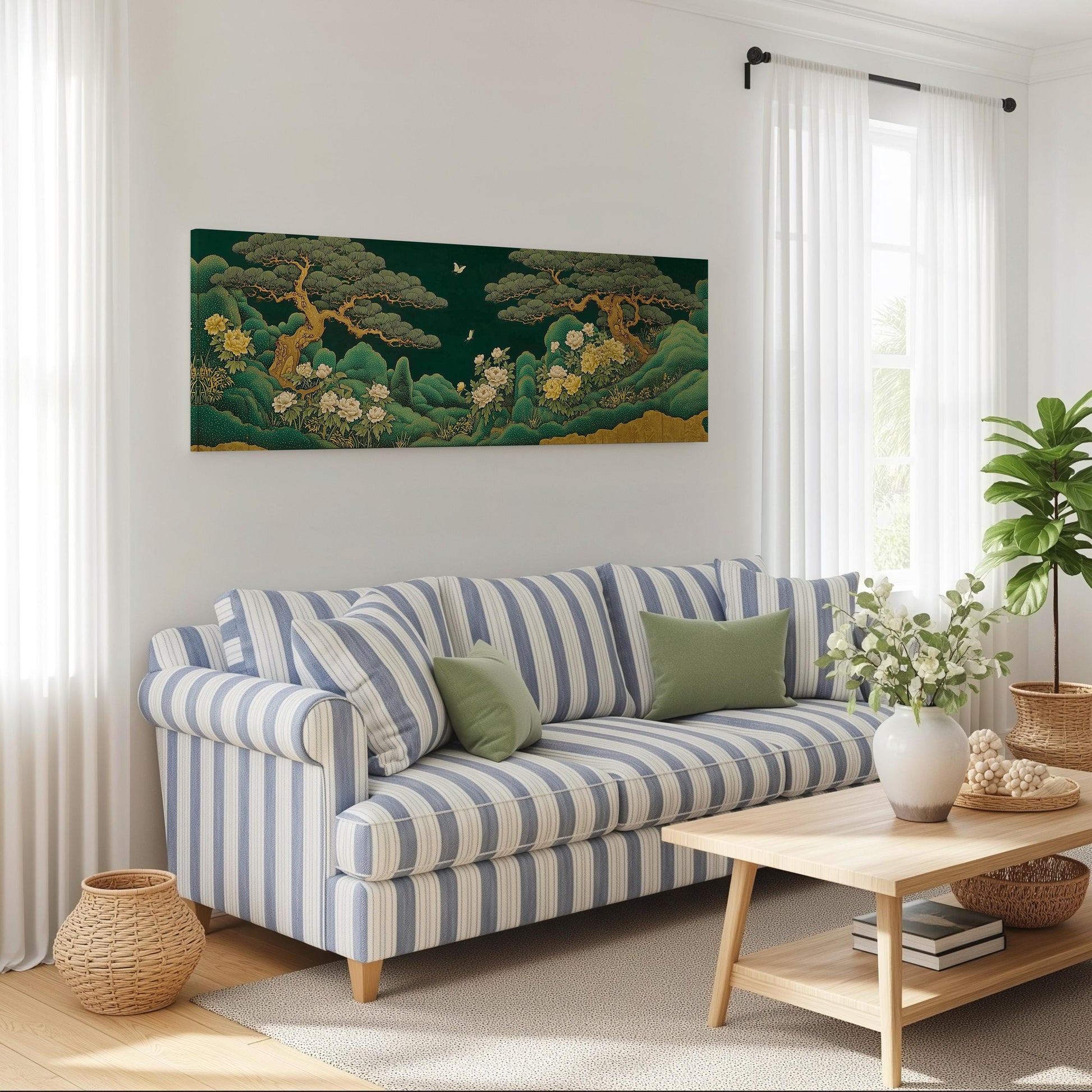 a cozy living room with a striped blue and white sofa, a wooden coffee table, and a large painting of a lush green landscape hanging on the wall above the sofa.