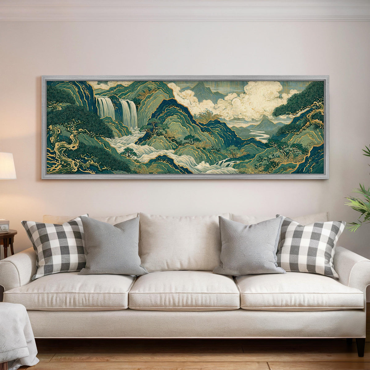 Emerald waterfall mountains with gold lines panoramic canvas print above a white sofa in a bright living room