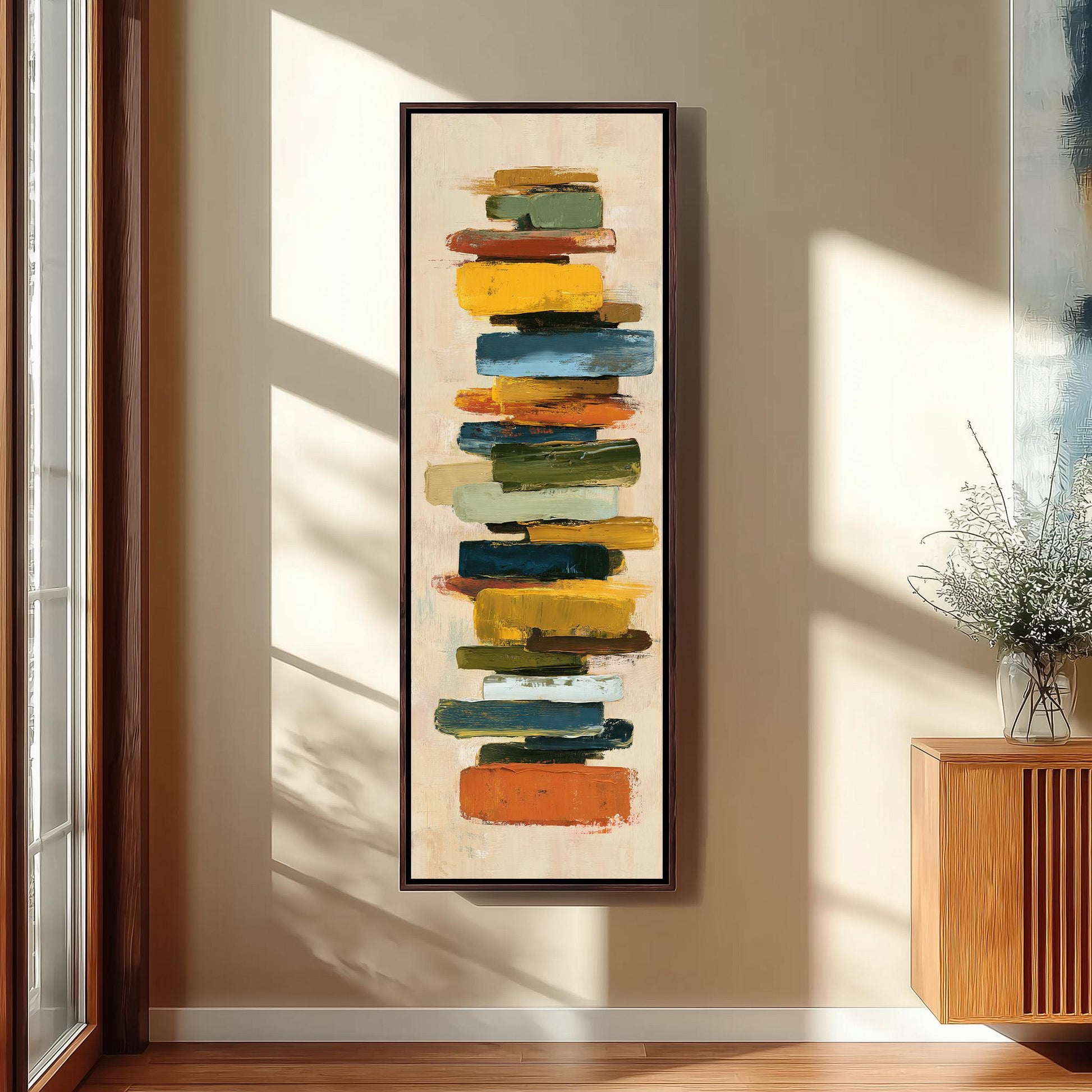 a large, abstract painting hanging on a wall in a room with a wooden floor and a window.