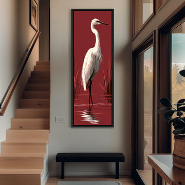 White egret wading on crimson red long vertical canvas print in a sunlit living space
