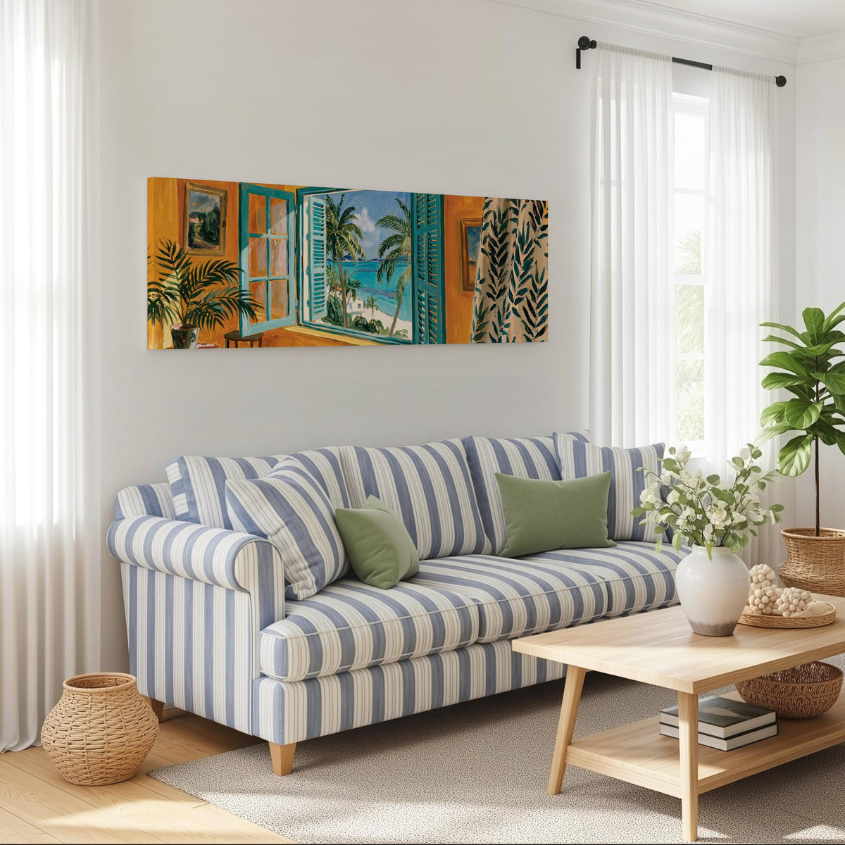 Beach house window overlooking palms and sea long horizontal canvas print above a striped sofa in a coastal living room