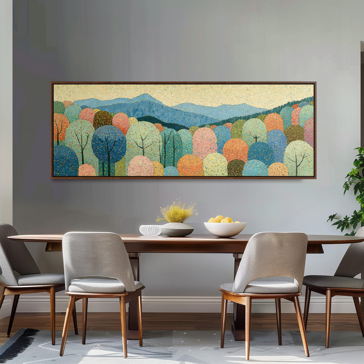 Pastel dotted forest below blue mountains long horizontal canvas print above a dining table