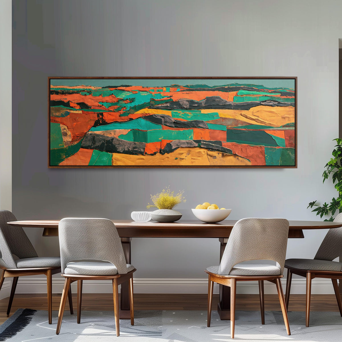 Abstract patchwork terrain in orange and teal long horizontal canvas print above a dining table