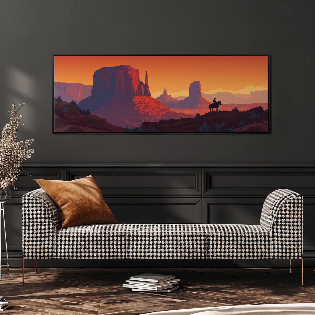a large, framed painting of a desert landscape with mountains and a cowboy on horseback.