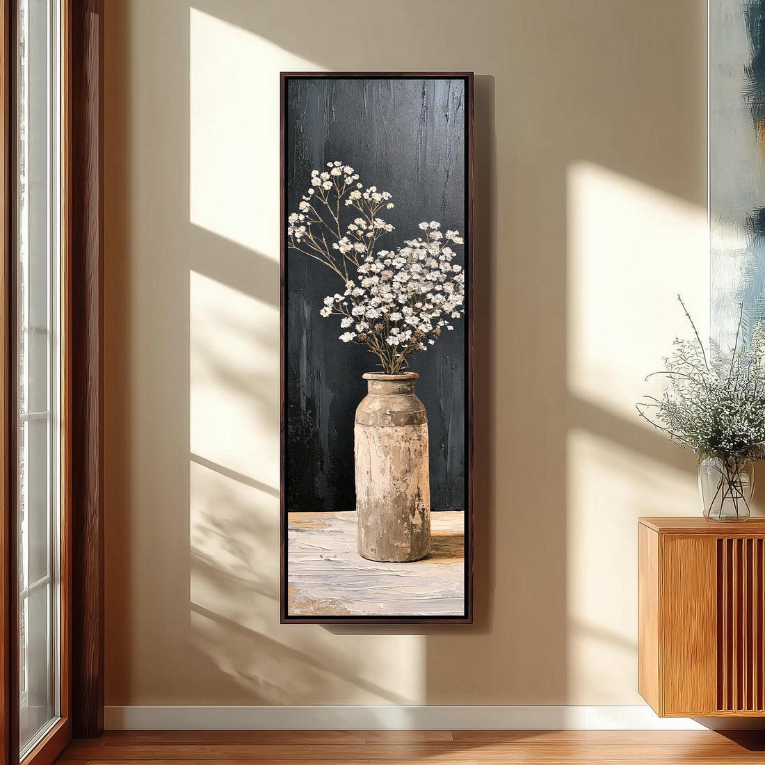 Baby's breath in a stone vase long vertical canvas print in a sunlit living space