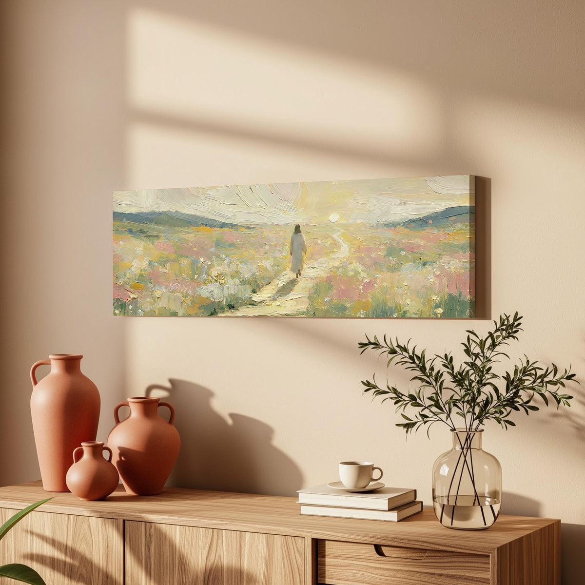 Jesus walking a pastel meadow path long horizontal canvas print above a wooden sideboard