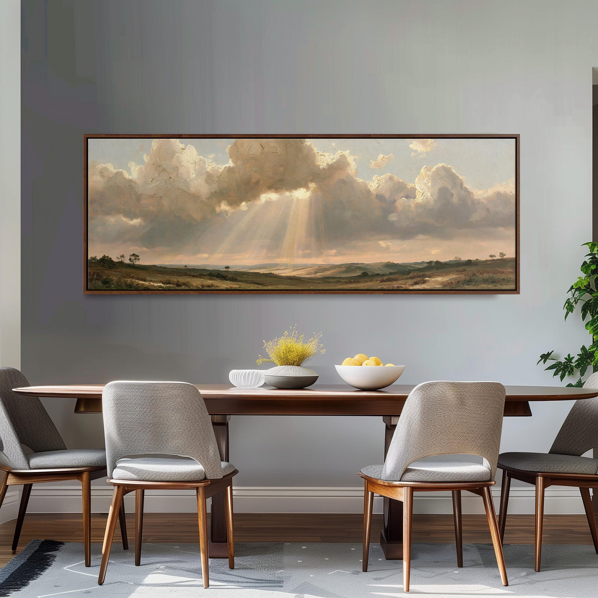 Sunbeams breaking through clouds over plains long horizontal canvas print above a dining table