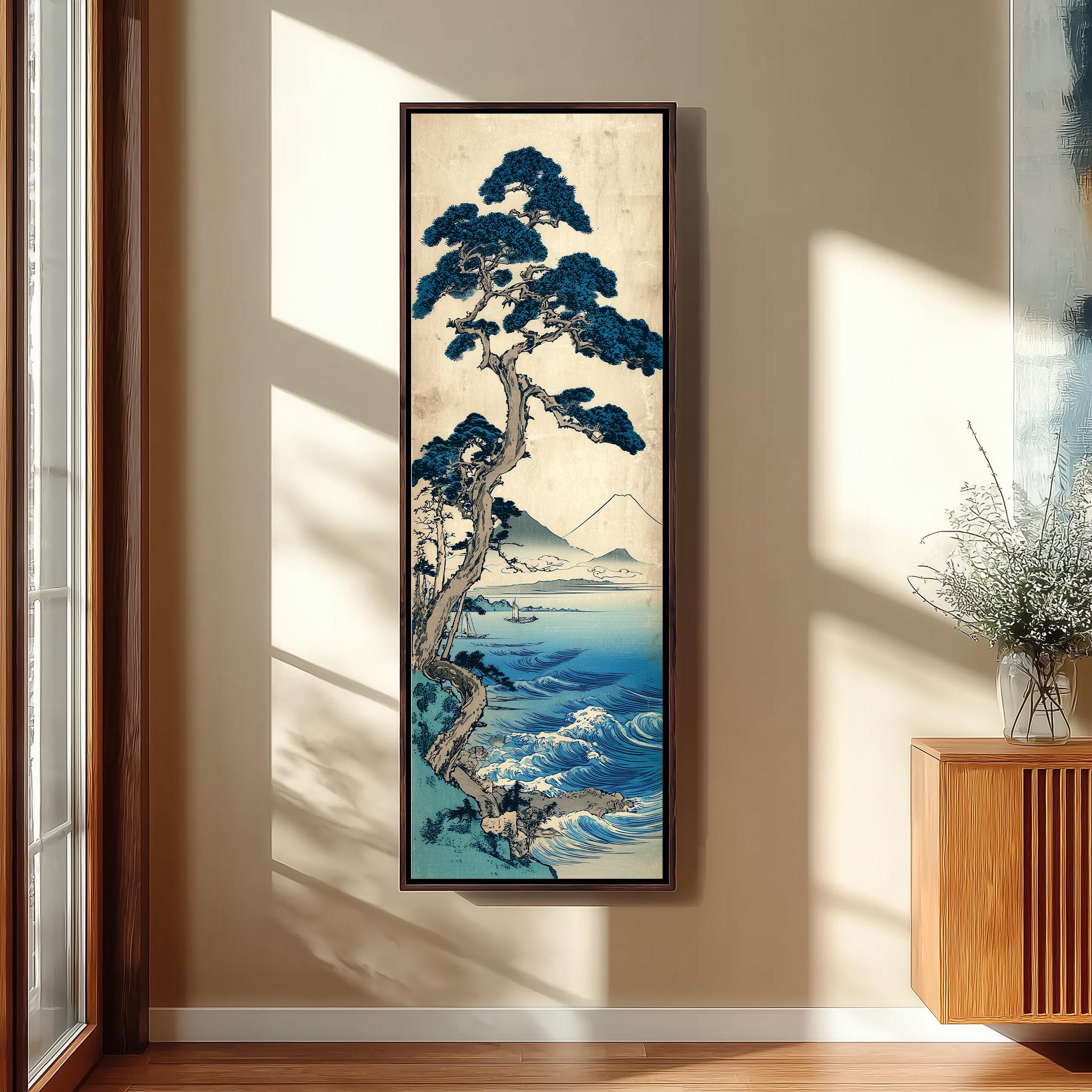a large framed painting of a blue pine tree with a mountainous landscape in the background, hanging on a wall in a room with a wooden cabinet and a vase of flowers.