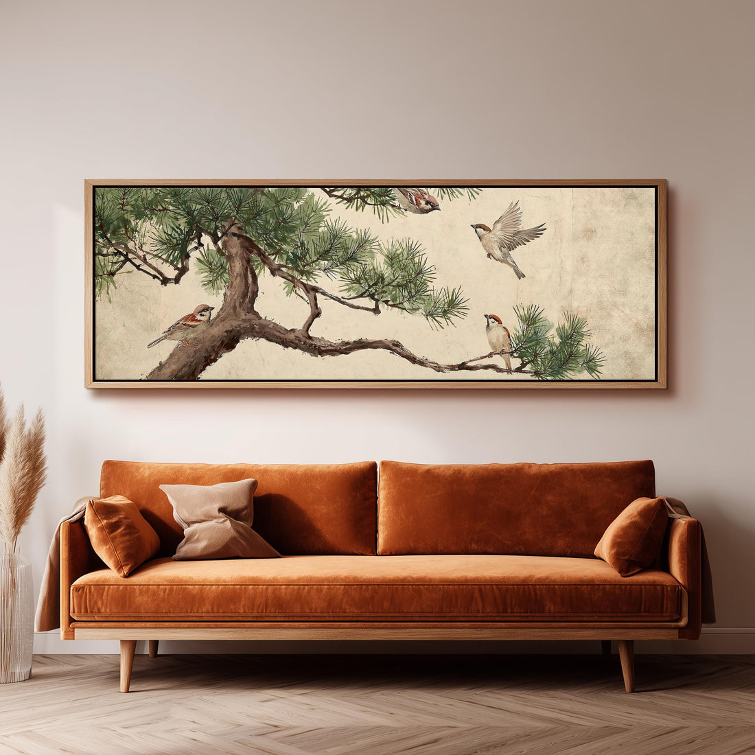 Sparrows on a pine branch long horizontal canvas print above a sofa in a living room