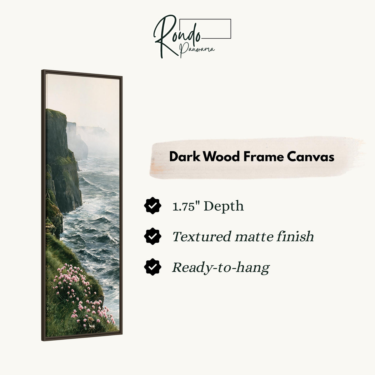 Misty sea cliffs with pink wildflowers canvas print in a dark wood floating frame