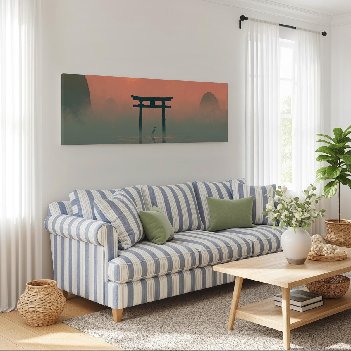 Torii gate and heron in pink mist long horizontal canvas print above a striped sofa in a coastal living room