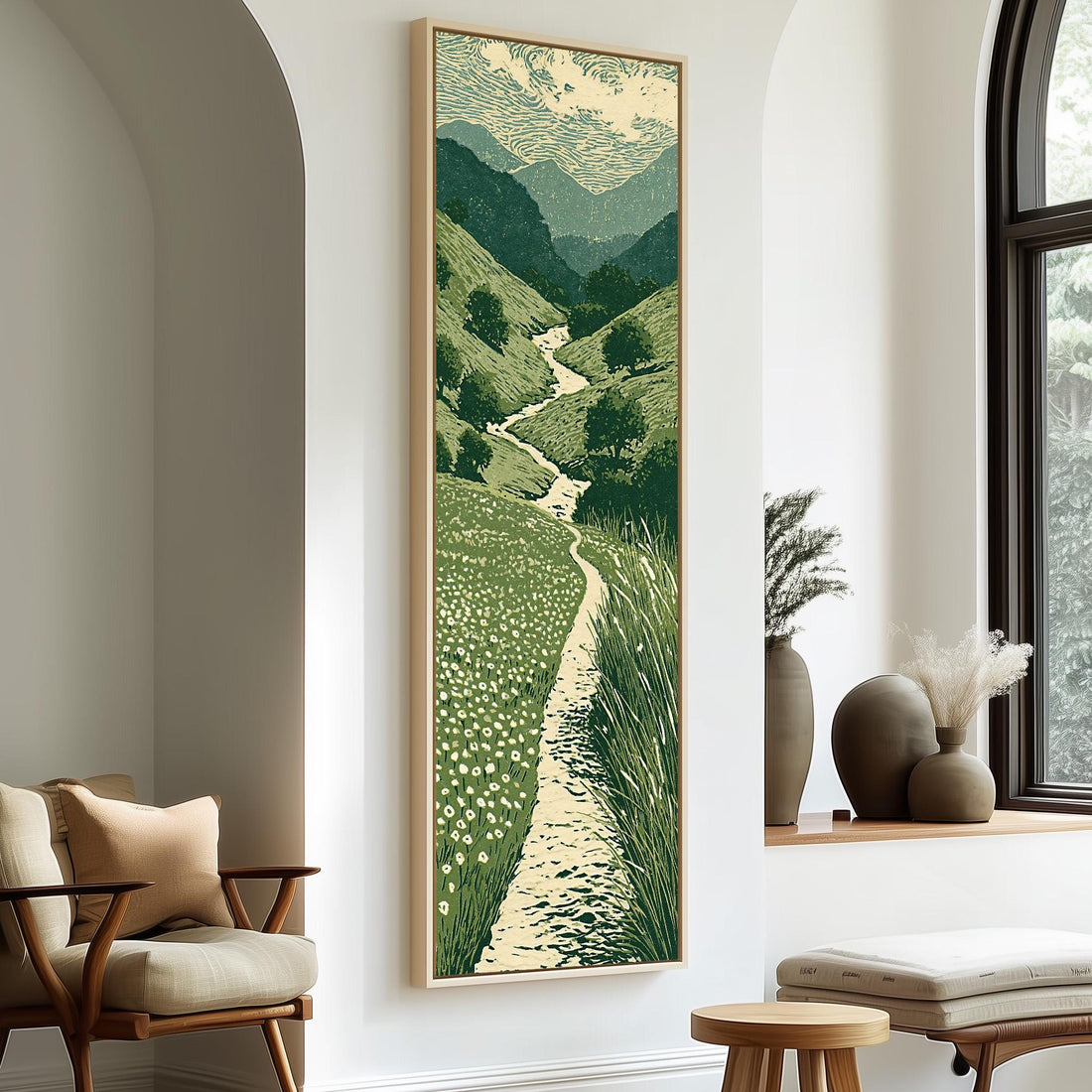 Trail winding through green mountains long vertical canvas print in a sunlit living space
