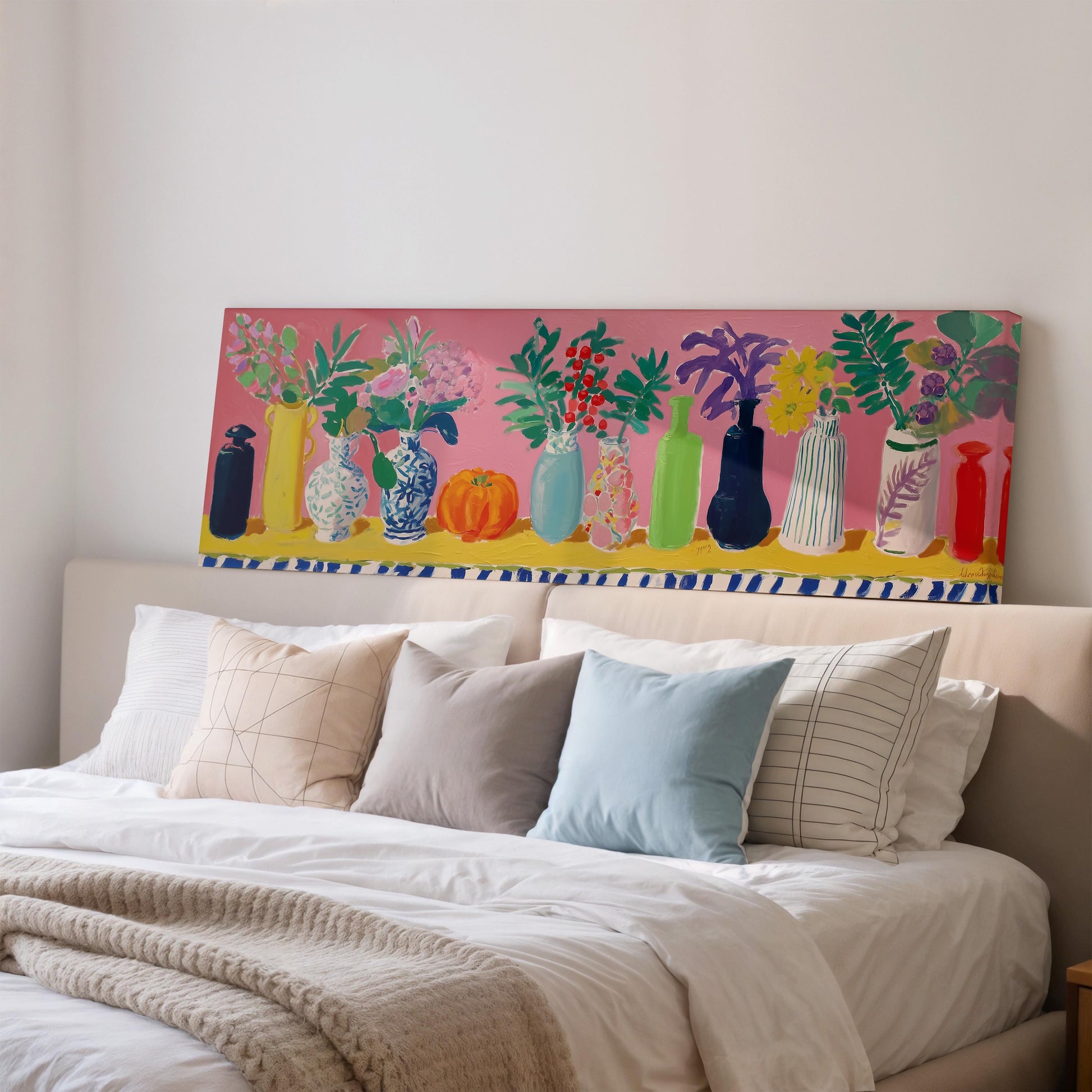 a bedroom with a bed and a large painting of vases on the wall above it.