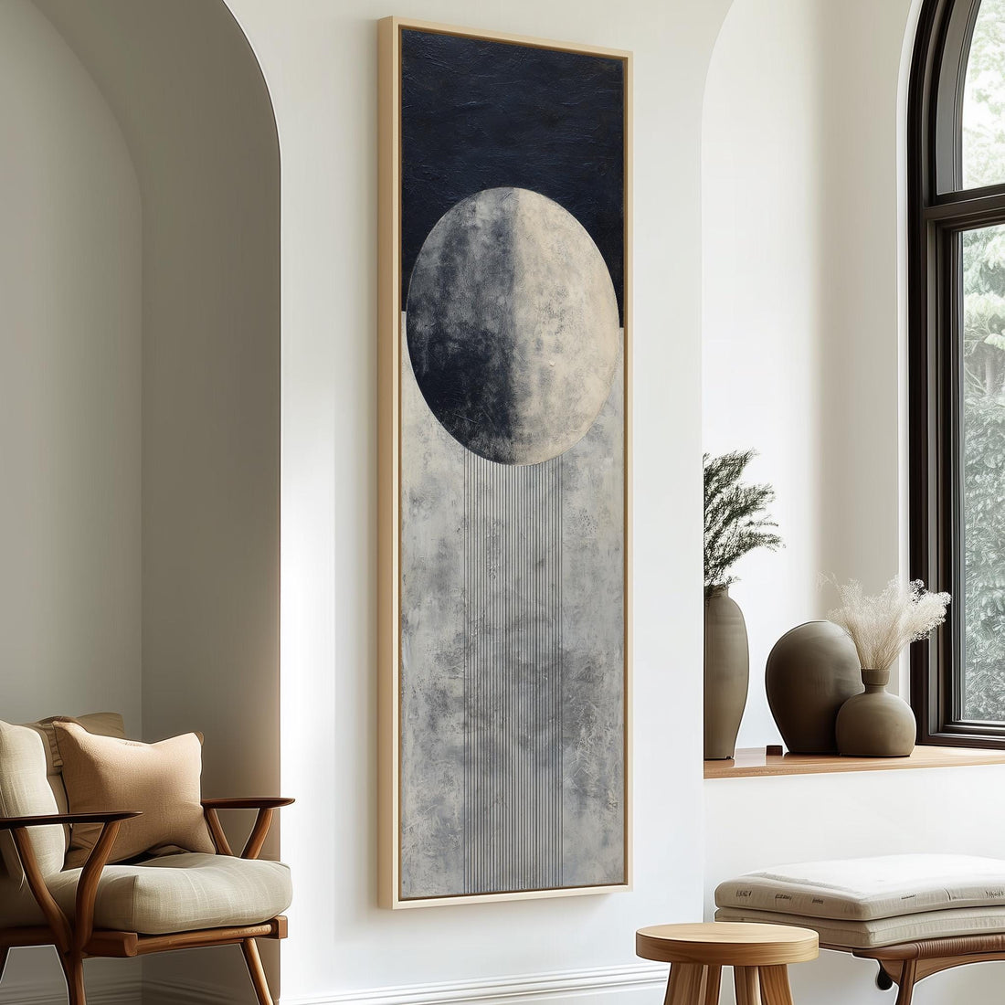a hallway with a large painting of a moon hanging on the wall, a wooden staircase, a black bench, and a plant in a pot.