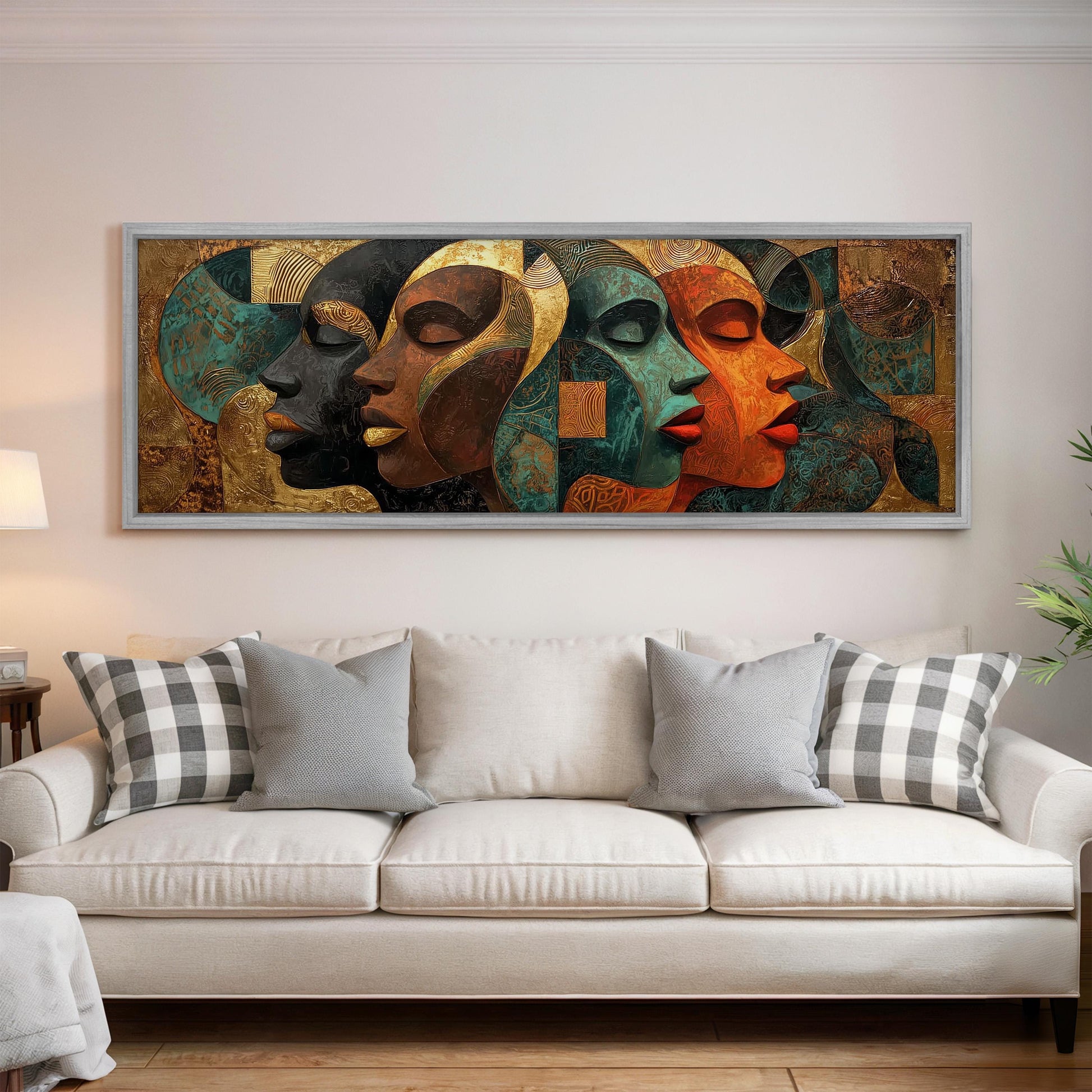 a large, colorful abstract painting hanging on a wall above a white couch in a living room.