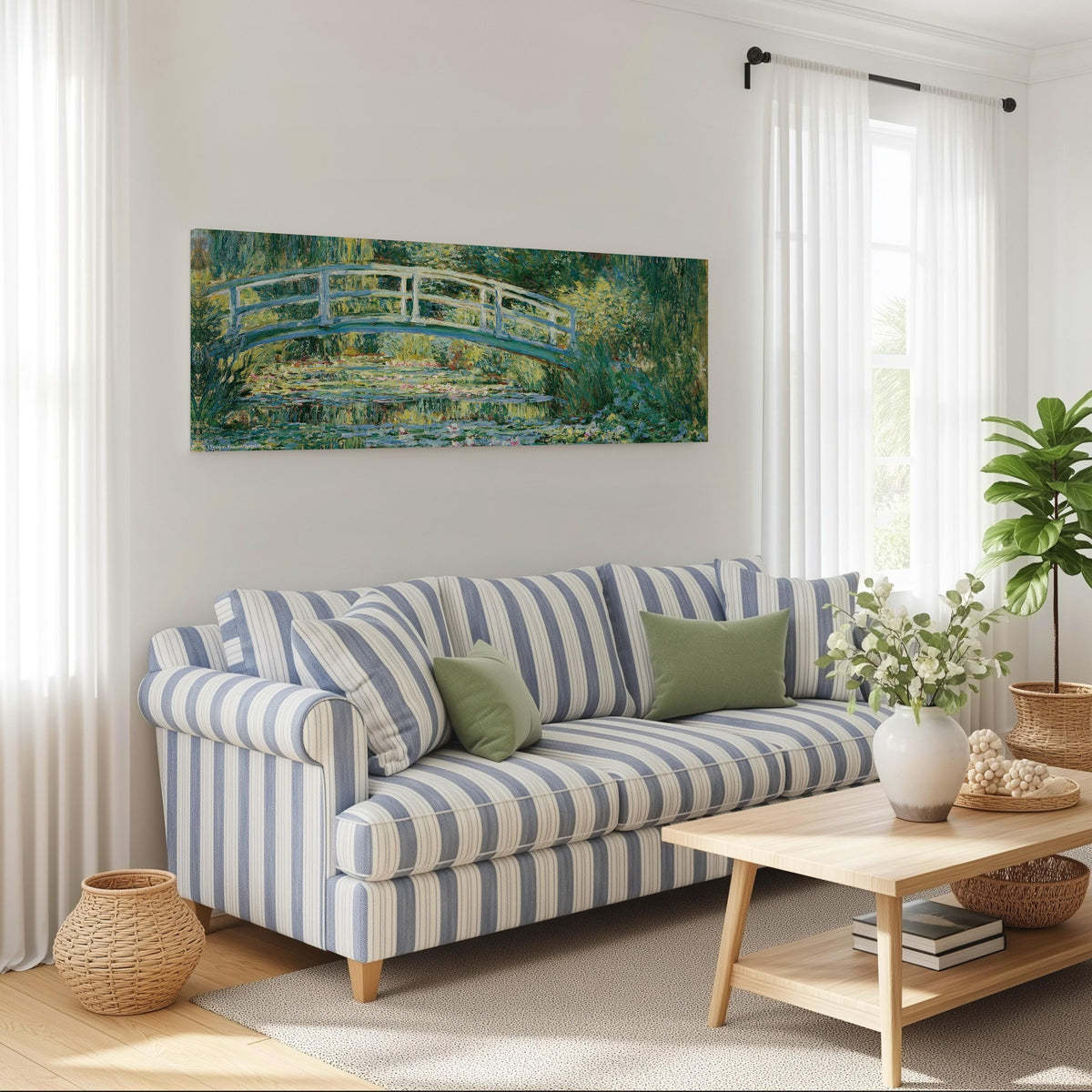 Japanese bridge over a water lily pond long horizontal canvas print above a striped sofa in a coastal living room