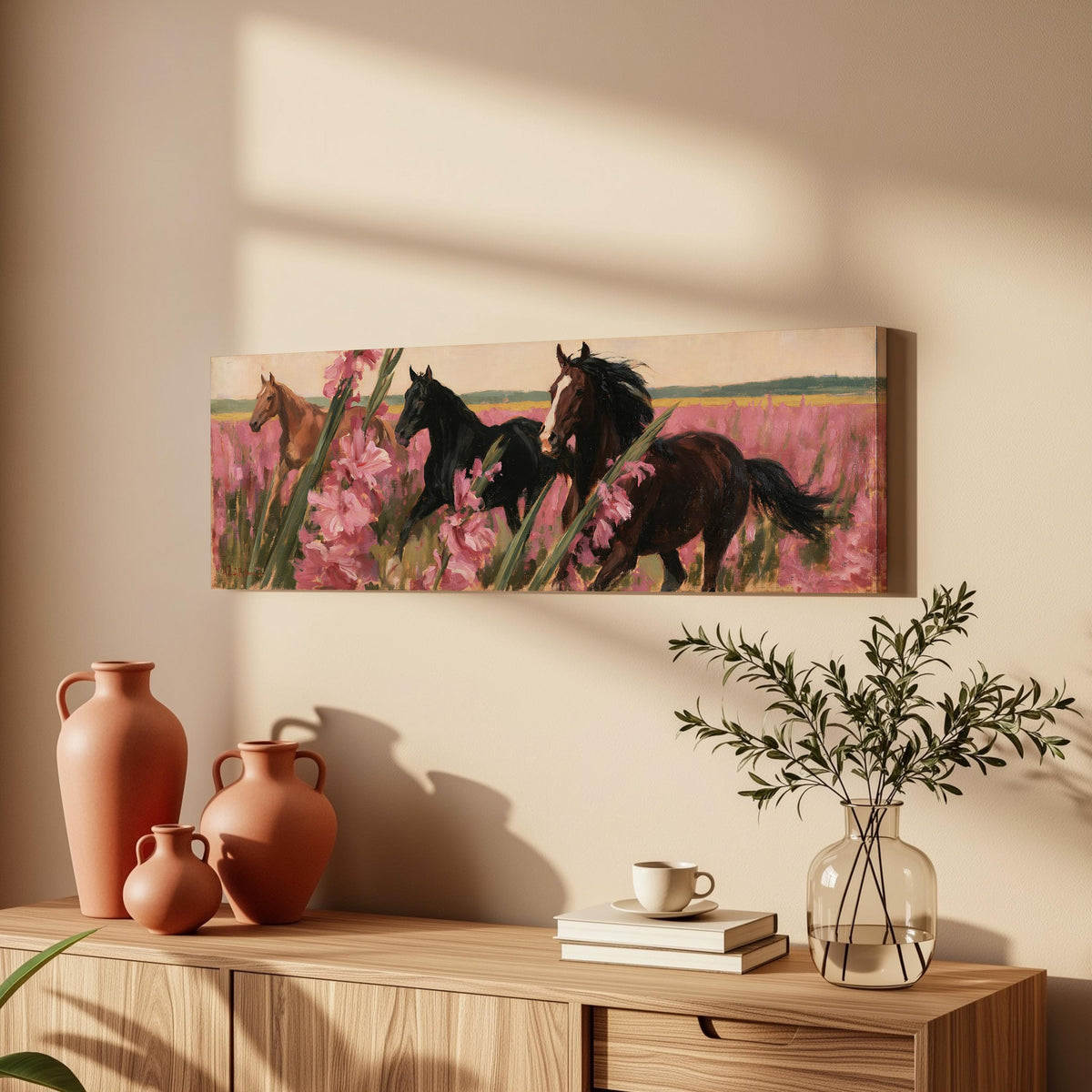 Horses running through pink gladiolus long horizontal canvas print above a wooden sideboard