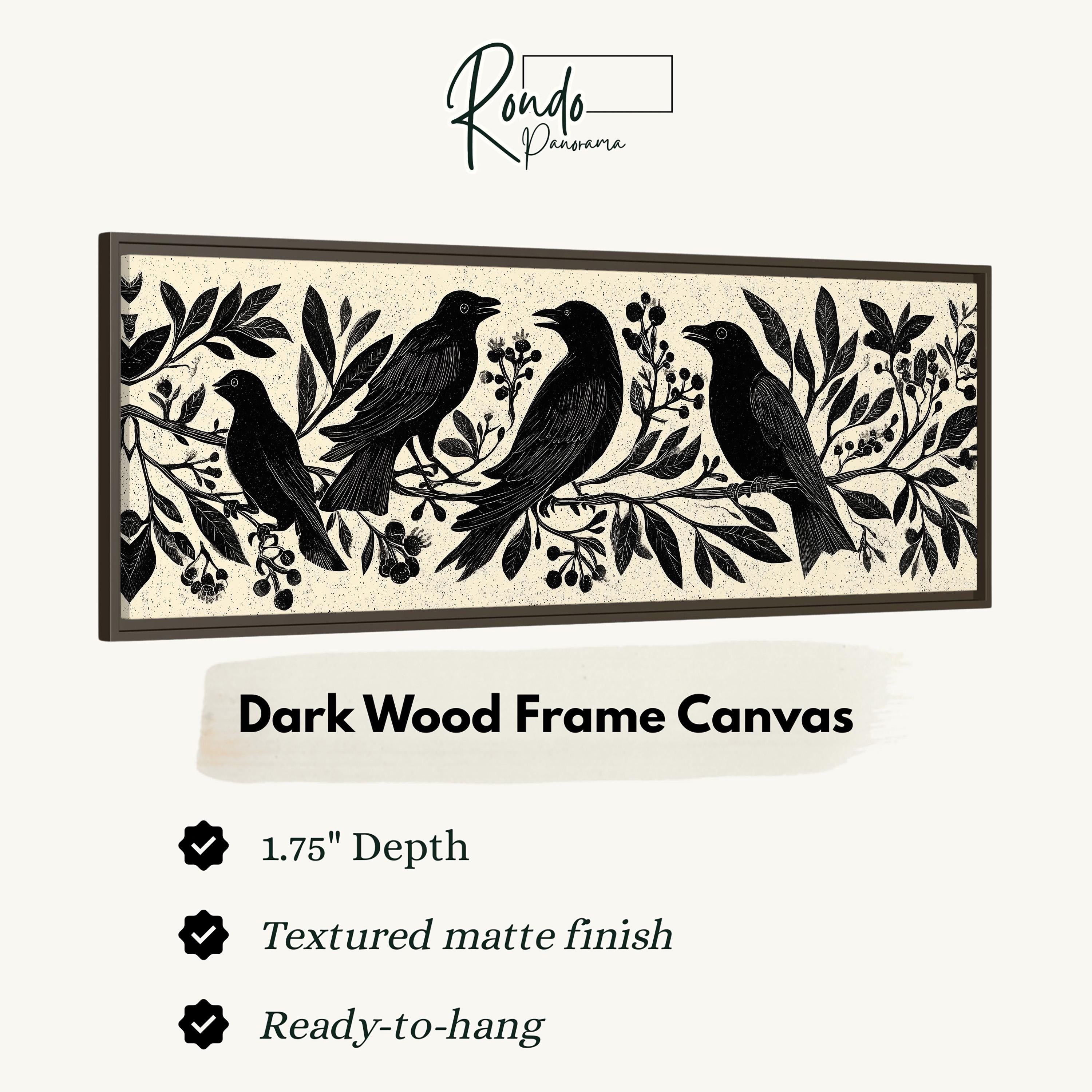 The image is a framed artwork depicting a group of black birds perched on branches with leaves and berries. The artwork is described as a "Dark Wood Frame Canvas" with a 1.75" depth, a textured matte finish, and a ready-to-hang feature.
