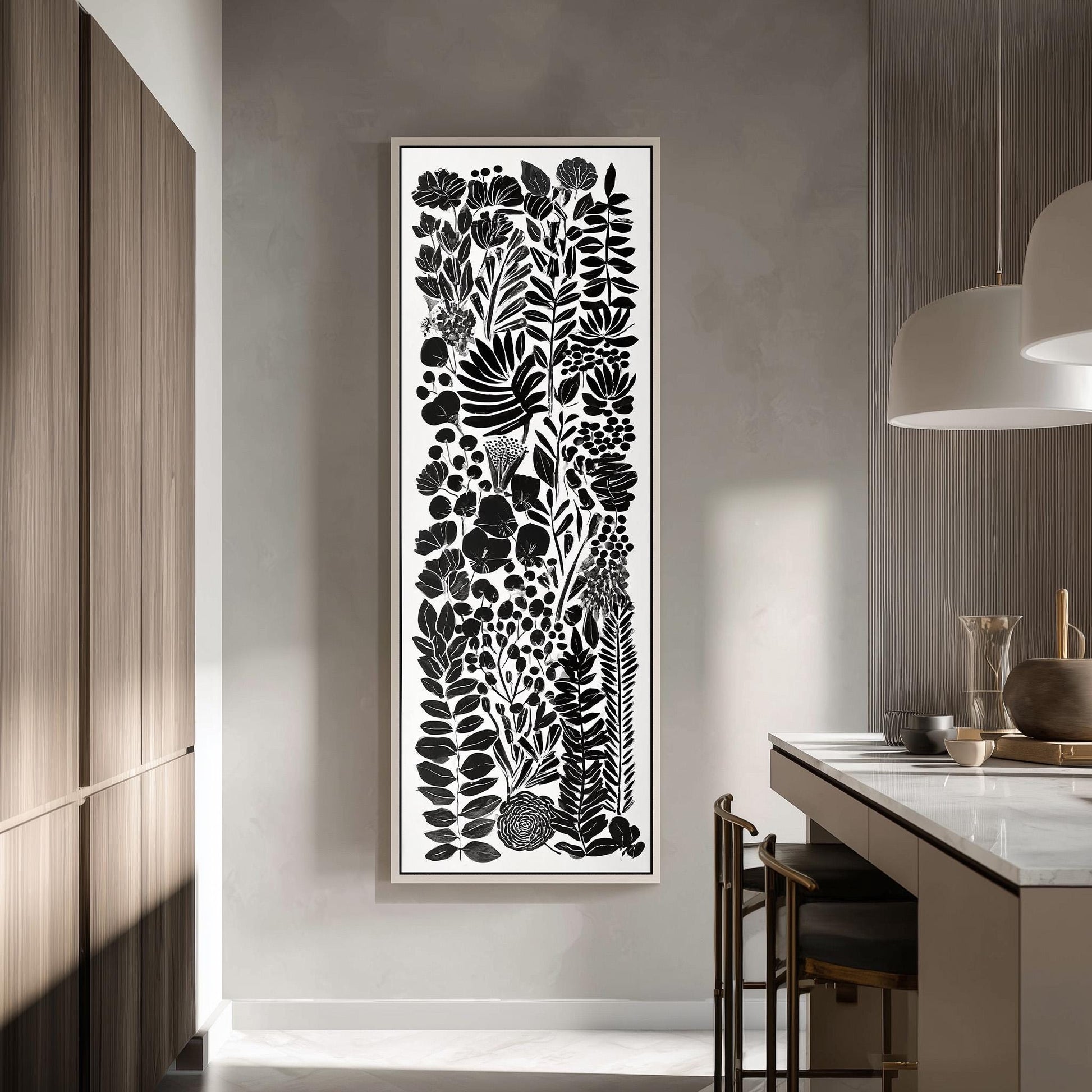 a modern kitchen with a large black and white abstract artwork hanging on the wall.