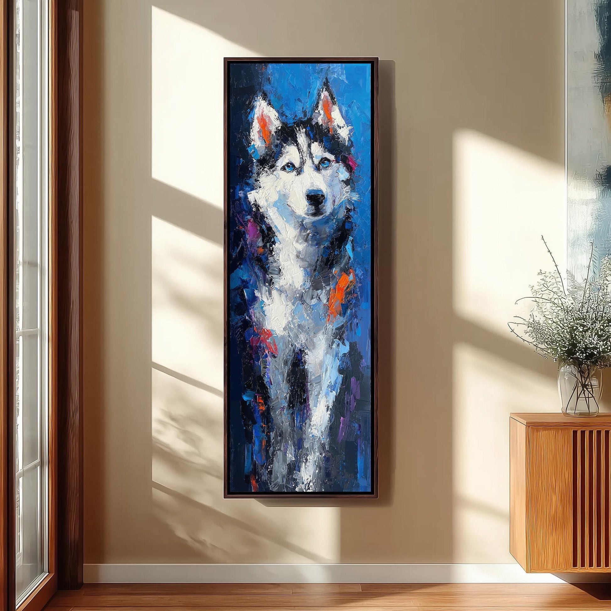 a large, colorful painting of a husky dog hanging on a wall in a room with a wooden floor and a window.