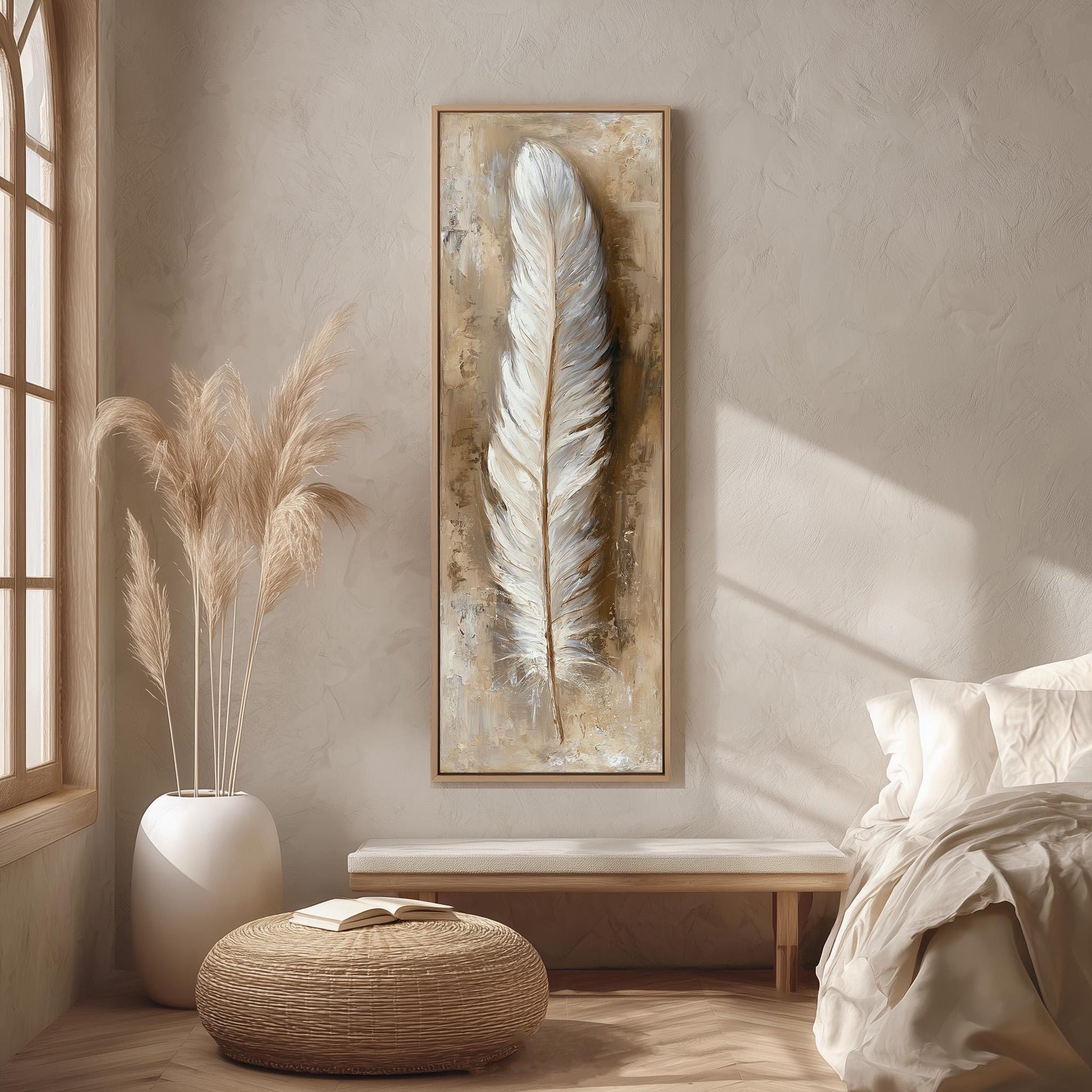 a serene and minimalist bedroom interior, featuring a large framed artwork of a feather on the wall, a white bed with a white pillow, a white vase with tall potted plants, and a woven ottoman.