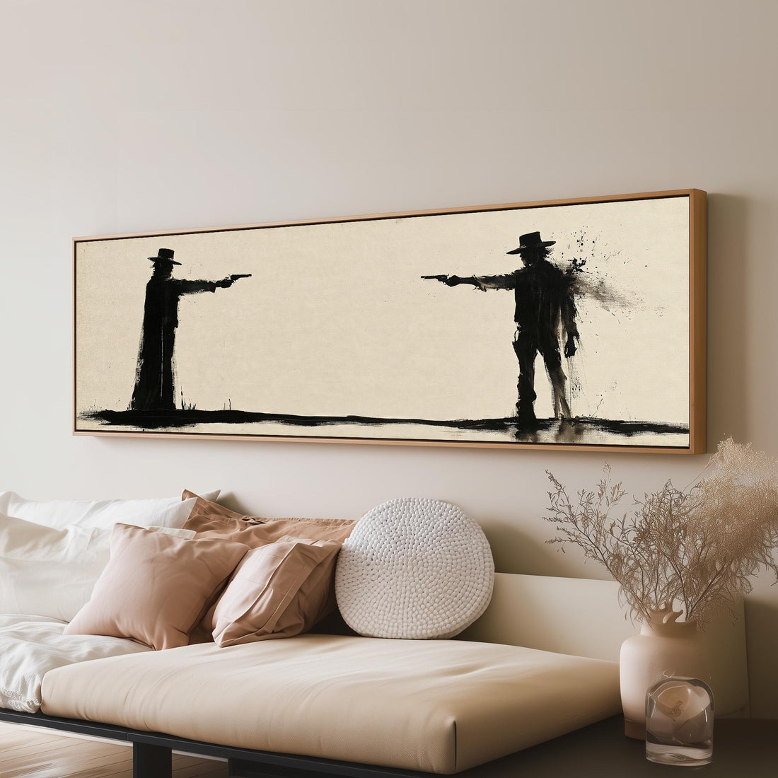 Ink silhouette of a cowboy duel long horizontal canvas print above a sofa in a living room