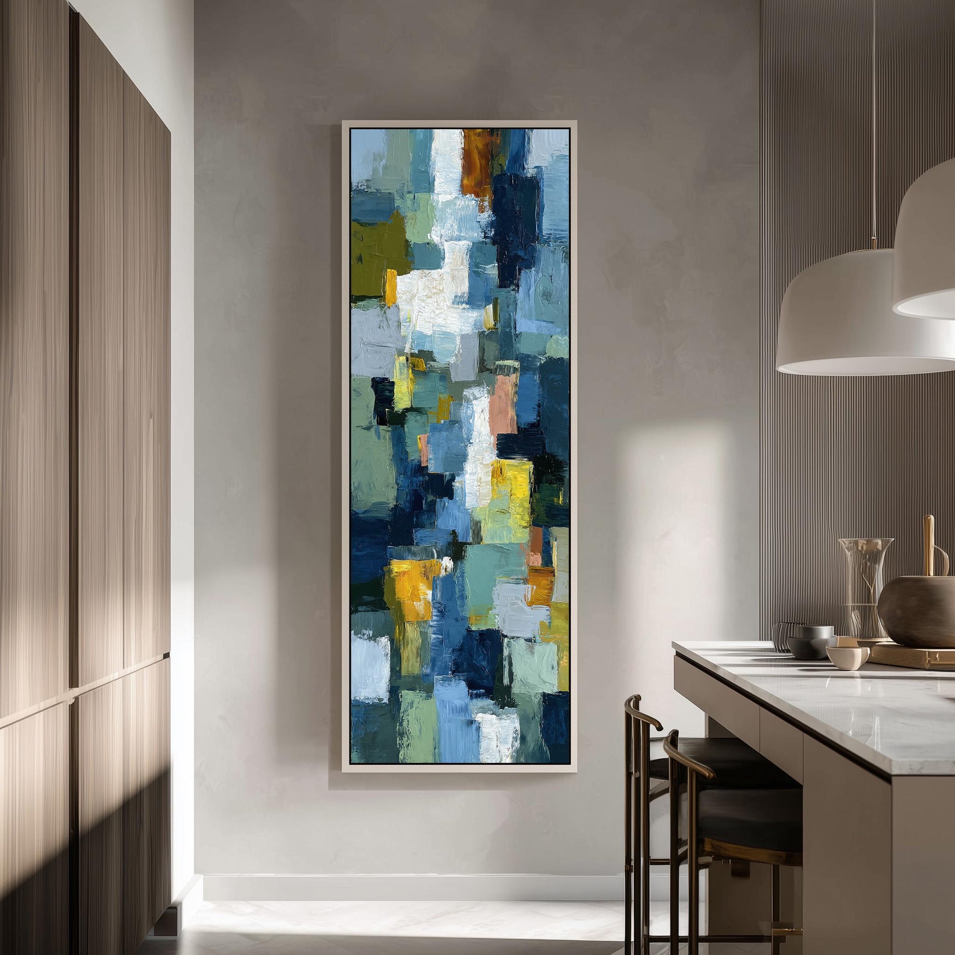 a large abstract painting hanging on a wall in a modern kitchen.