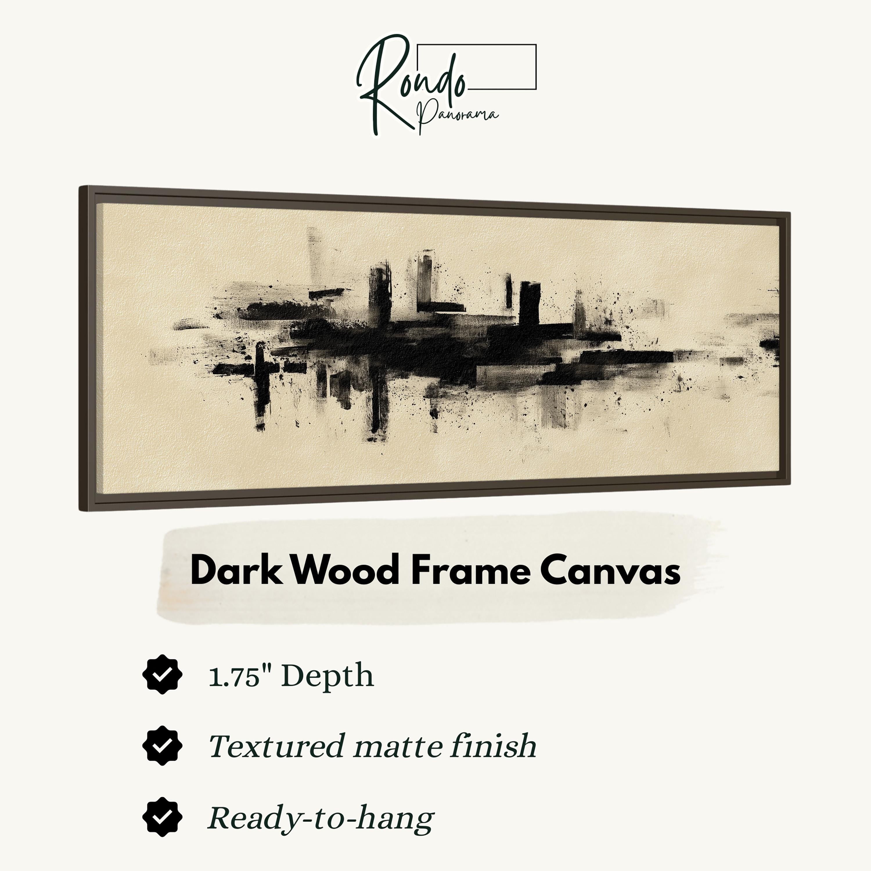 The image is a product advertisement for a dark wood frame canvas. It features a black and white abstract painting of a city skyline. The advertisement highlights the features of the canvas, including its 1.75" depth, textured matte finish, and ready-to-hang nature.