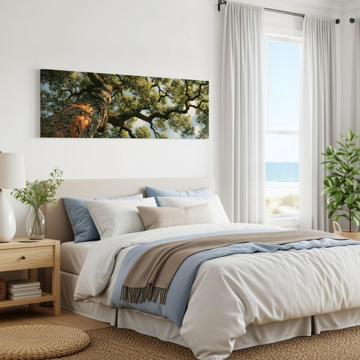 Ancient oak trunk and branches seen from below panoramic canvas print above a bed in a coastal bedroom
