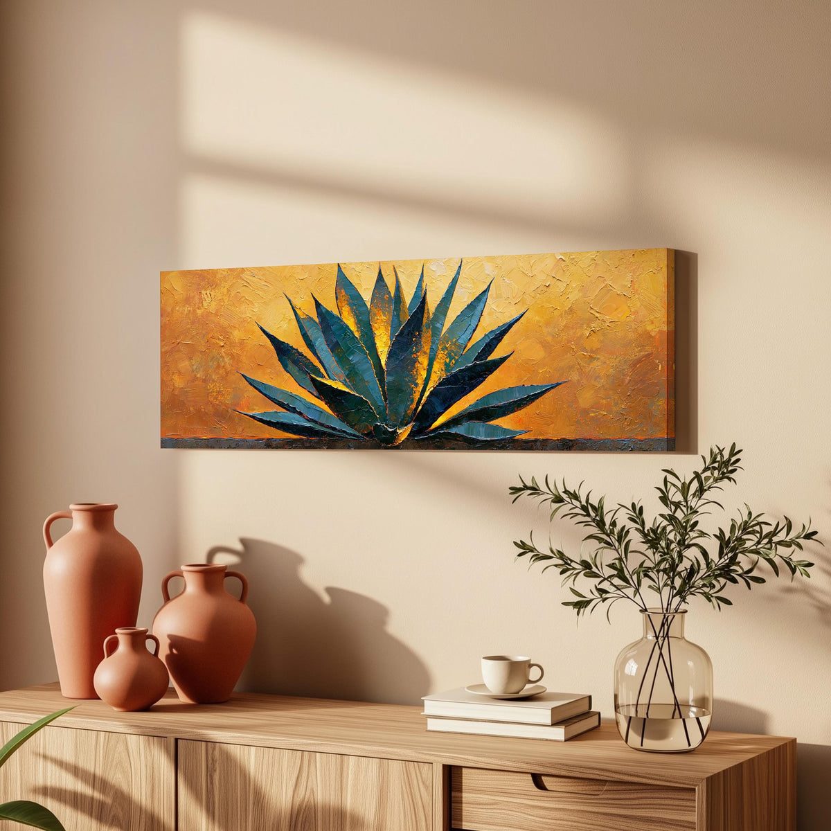 Blue agave on a textured gold background long horizontal canvas print above a wooden sideboard