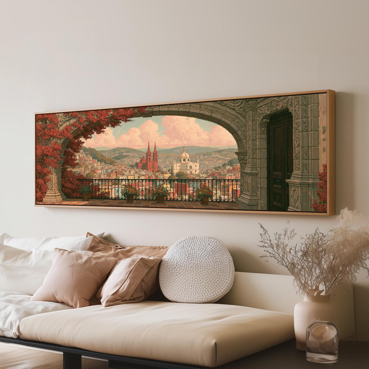 Old world city view through an archway panoramic canvas print above a sofa in a living room