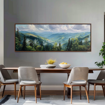 a large painting of a mountainous landscape hanging on a wall above a wooden dining table with four chairs.