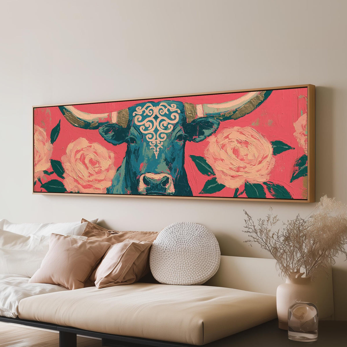 Longhorn with pink roses panoramic canvas print above a sofa in a living room
