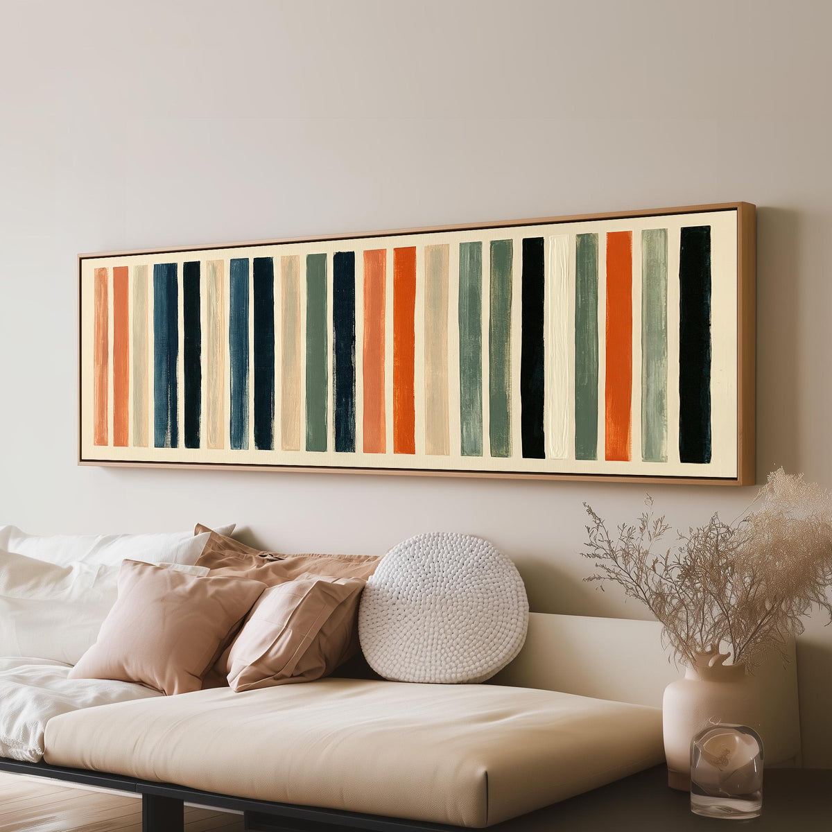 Bold peach, sage and navy stripes long horizontal canvas print above a sofa in a living room