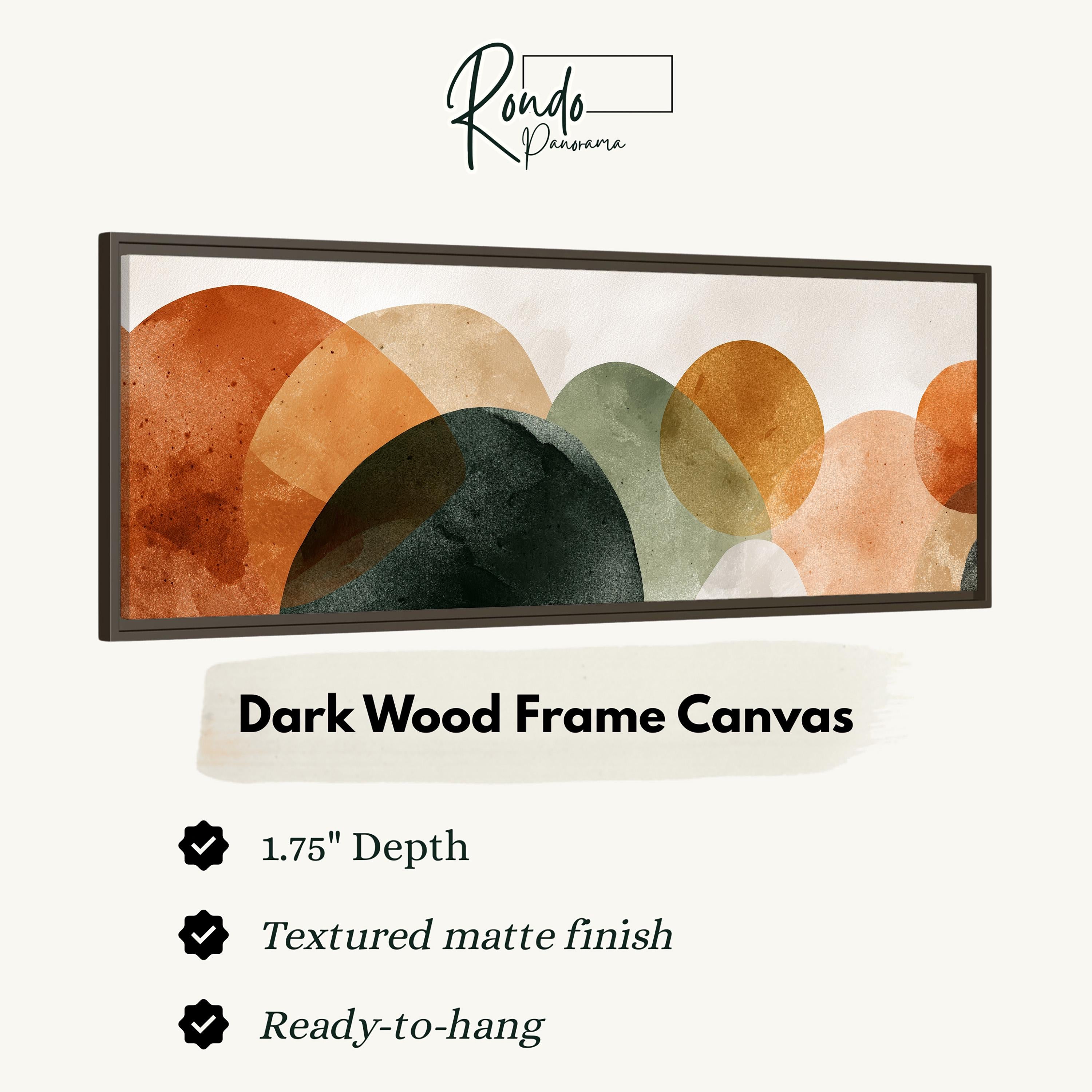 The image is a product advertisement for a dark wood frame canvas. It features a watercolor painting of overlapping circles in various shades of orange and green. The advertisement highlights the canvas's 1.75" depth, textured matte finish, and ready-to-hang feature.