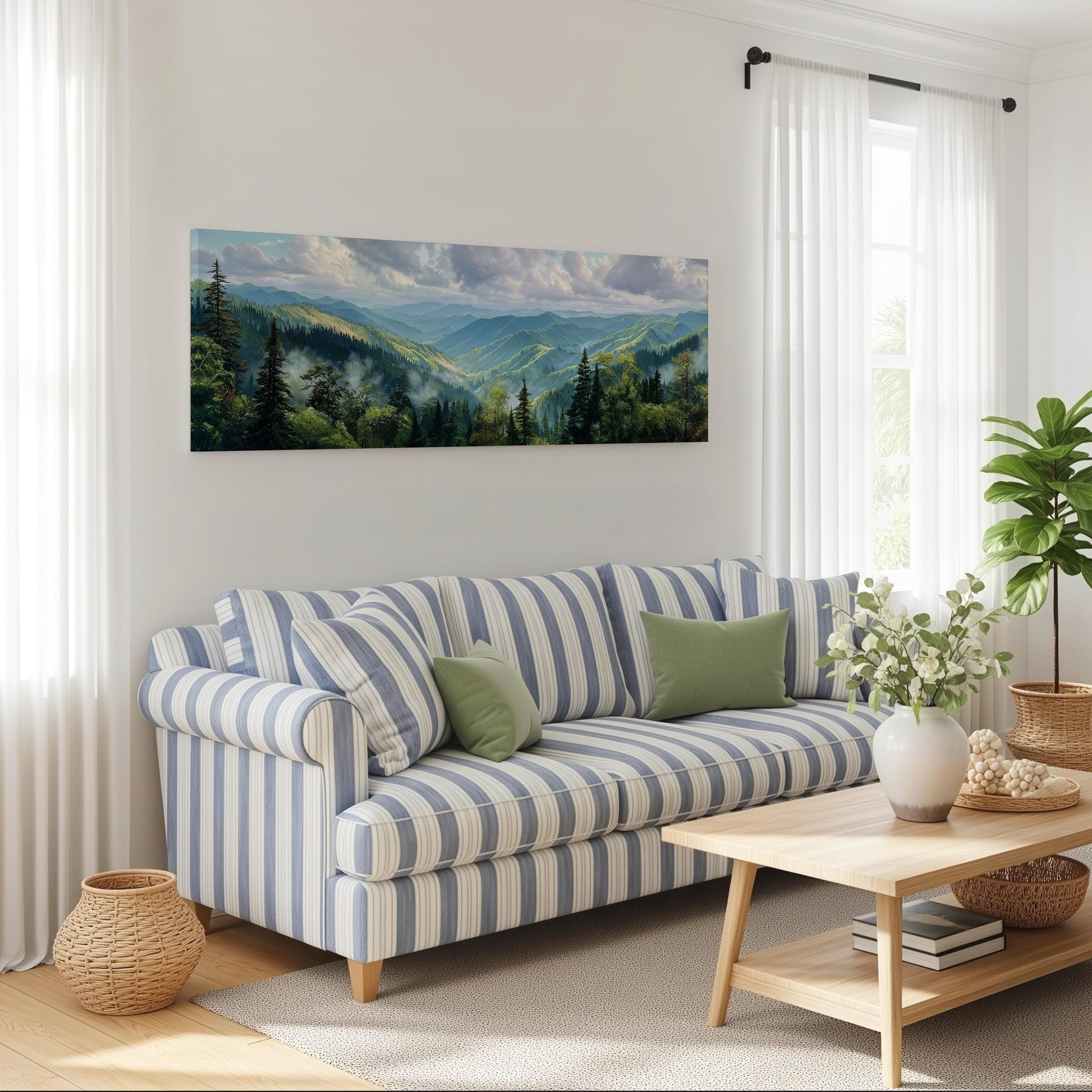 a living room with a blue and white striped sofa, a wooden coffee table, and a large landscape painting hanging on the wall above the sofa.