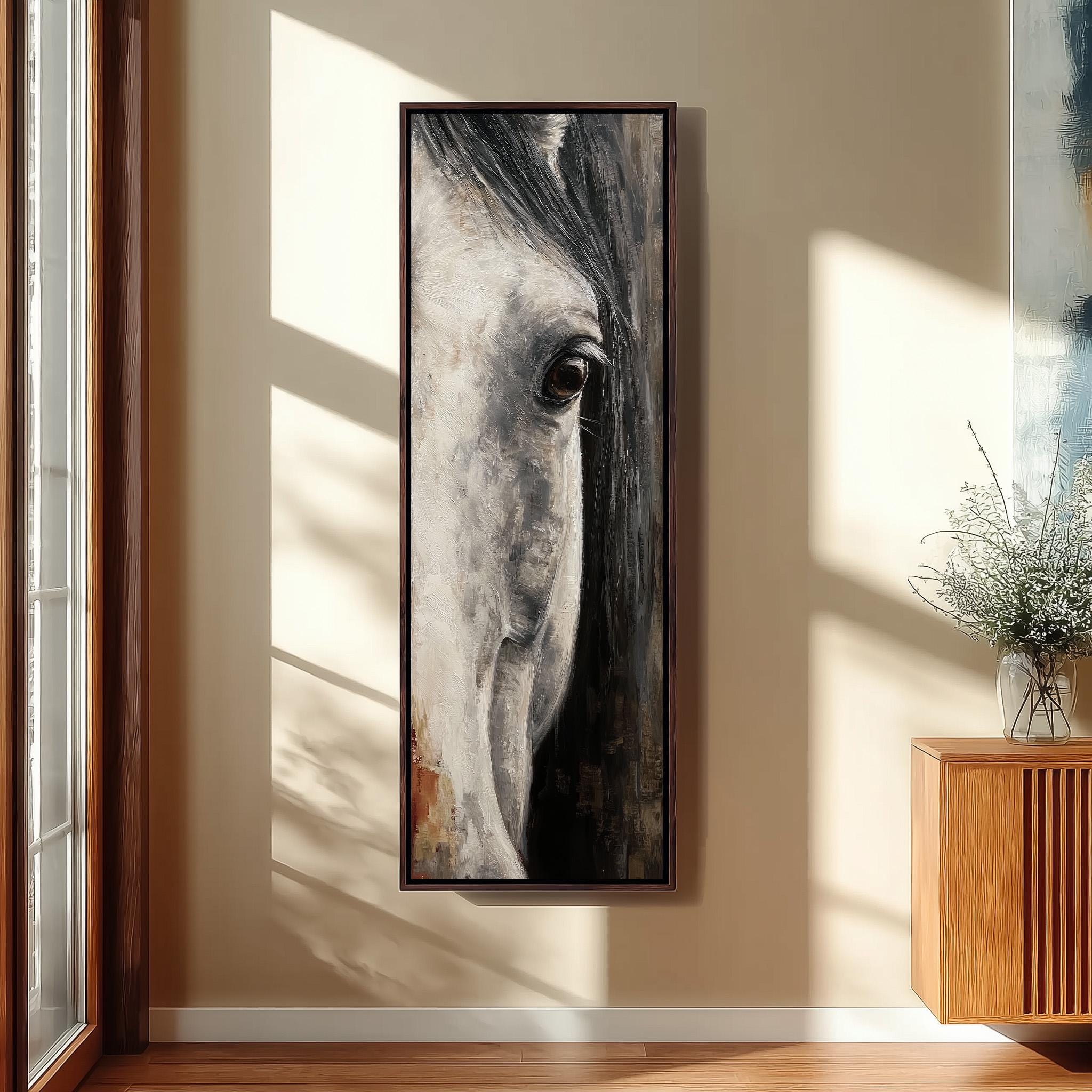 a large framed painting of a horse's face hanging on a wall.