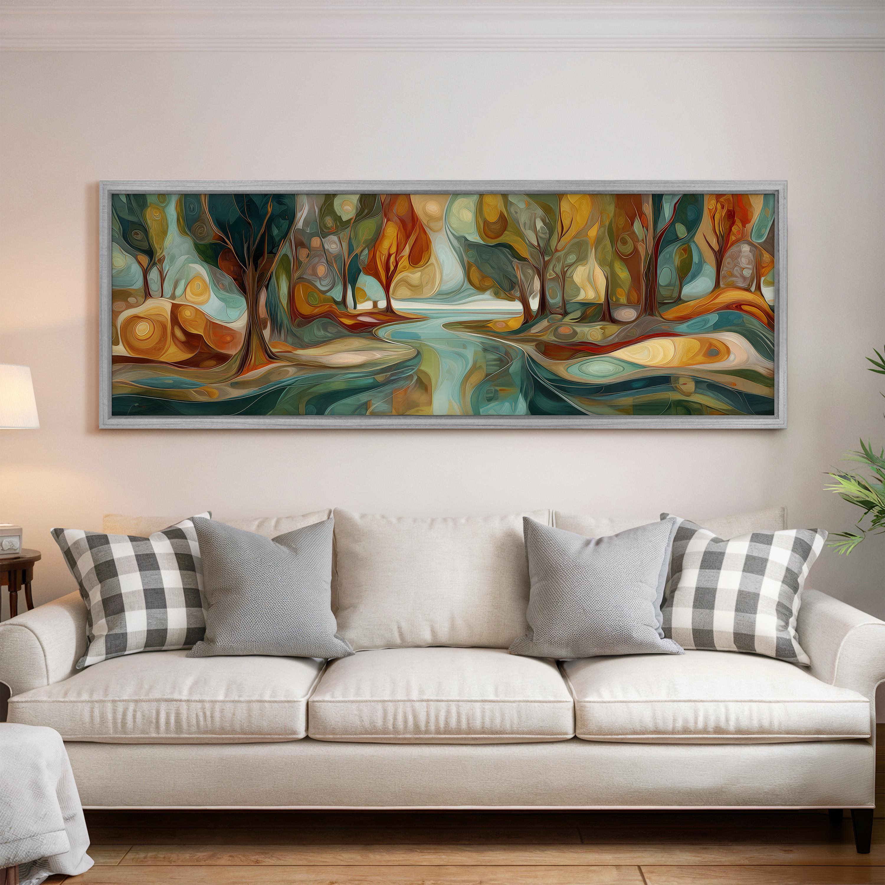 a large, colorful painting of a forest scene hanging on a wall above a white couch with gray and white plaid throw pillows.