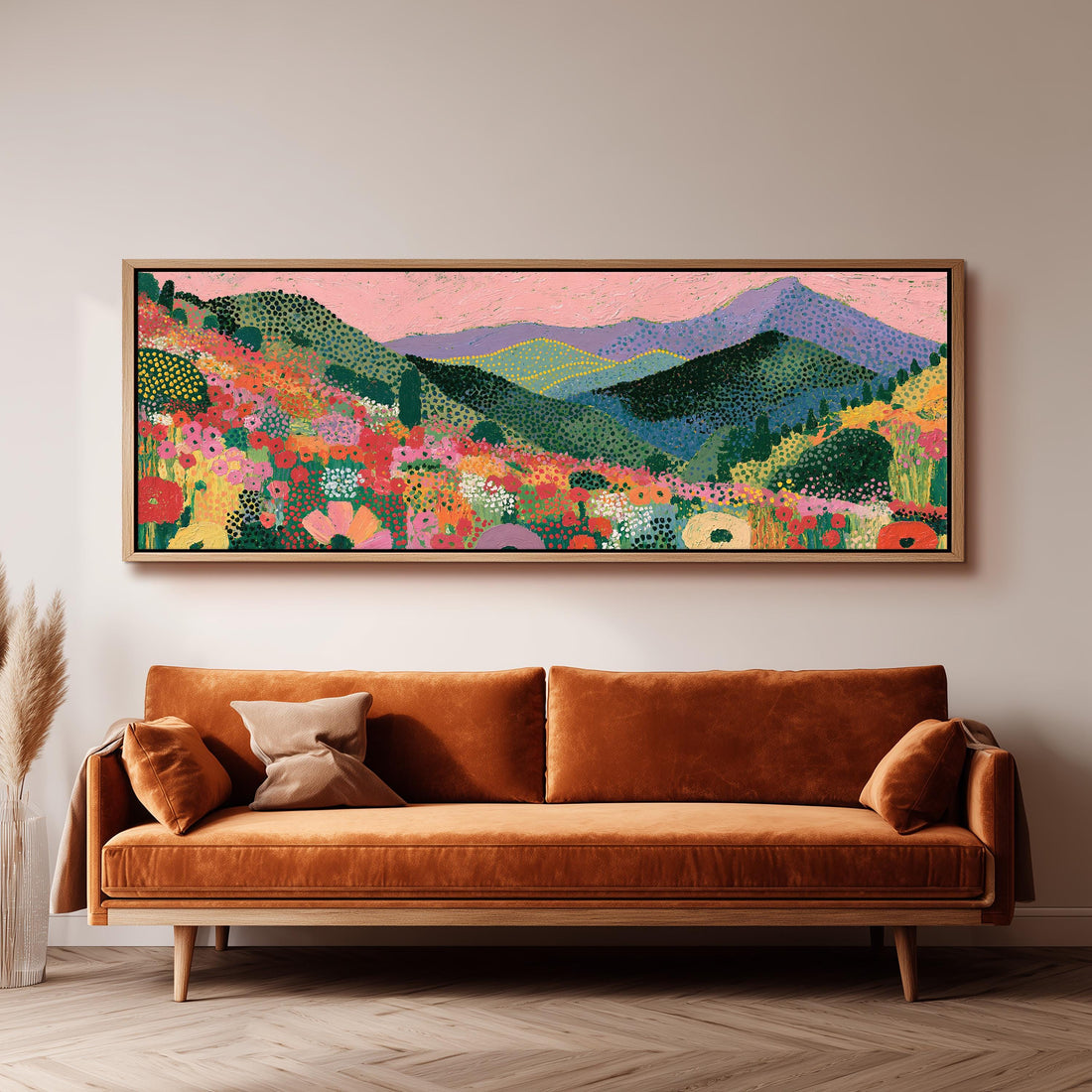 Purple mountains over a flower meadow long horizontal canvas print above a sofa in a living room