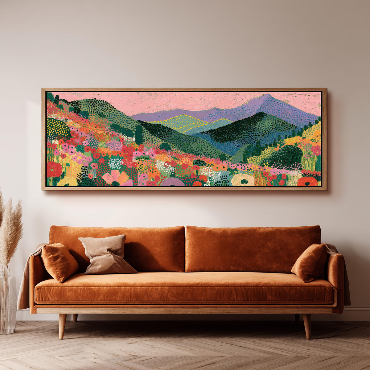 Purple mountains over a flower meadow long horizontal canvas print above a sofa in a living room