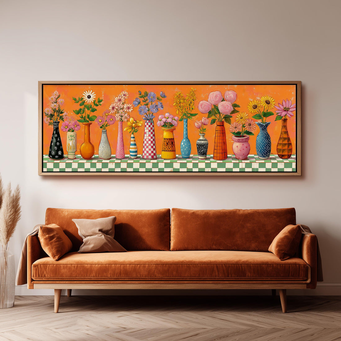a checkered sofa with a large, colorful painting of various vases and flowers displayed above it.