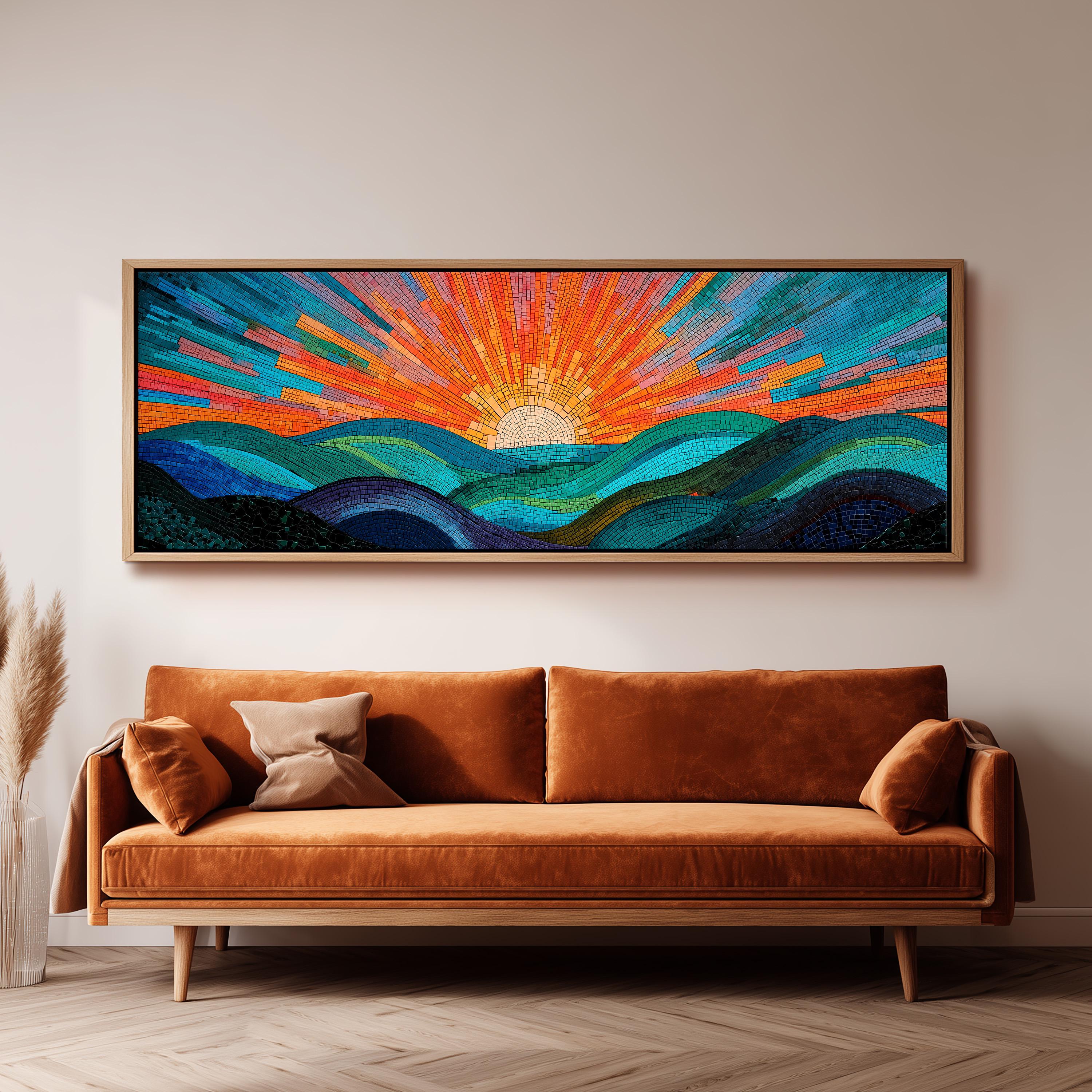 a large, vibrant mosaic artwork depicting a sunrise over a mountainous landscape, hanging on a wall above a brown sofa.